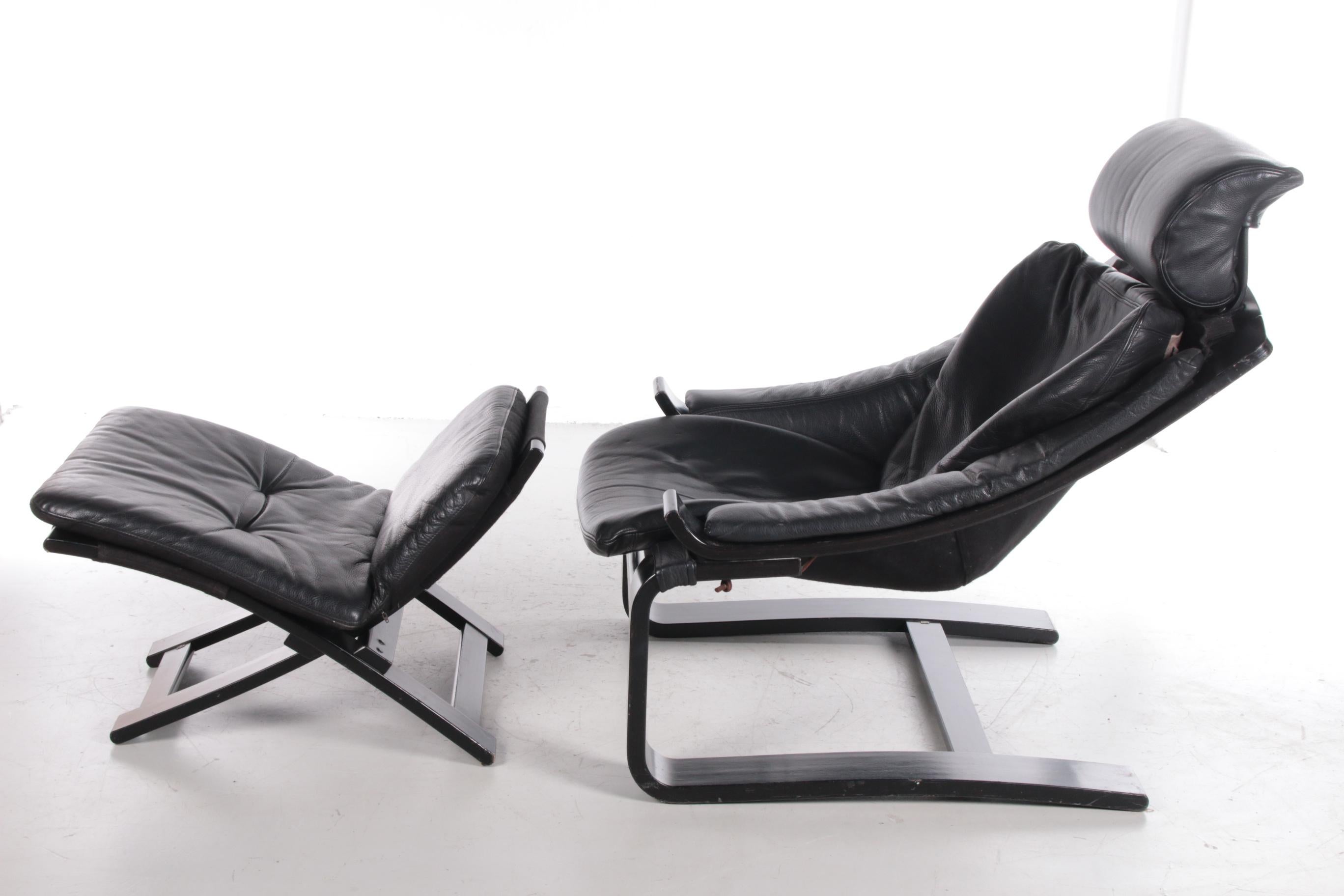 Mid-Century Modern Black Lounge Armchair and Footstool by Ake Fribytter for Nelo, Sweden