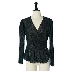 Top a portafoglio in lurex nero Circa 1970