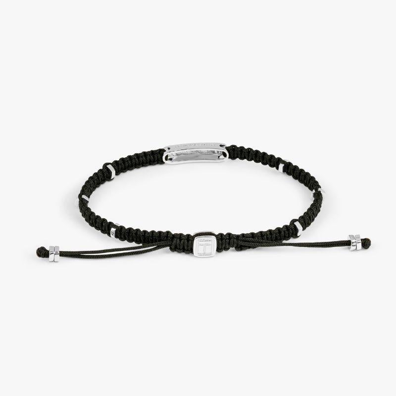 Black macramé bracelet with silver baton, Size L

The engravable sterling silver bar is set with rhodium plated, sterling silver disc elements added around the bracelet to give little flashes of light throughout the design. Our intricately