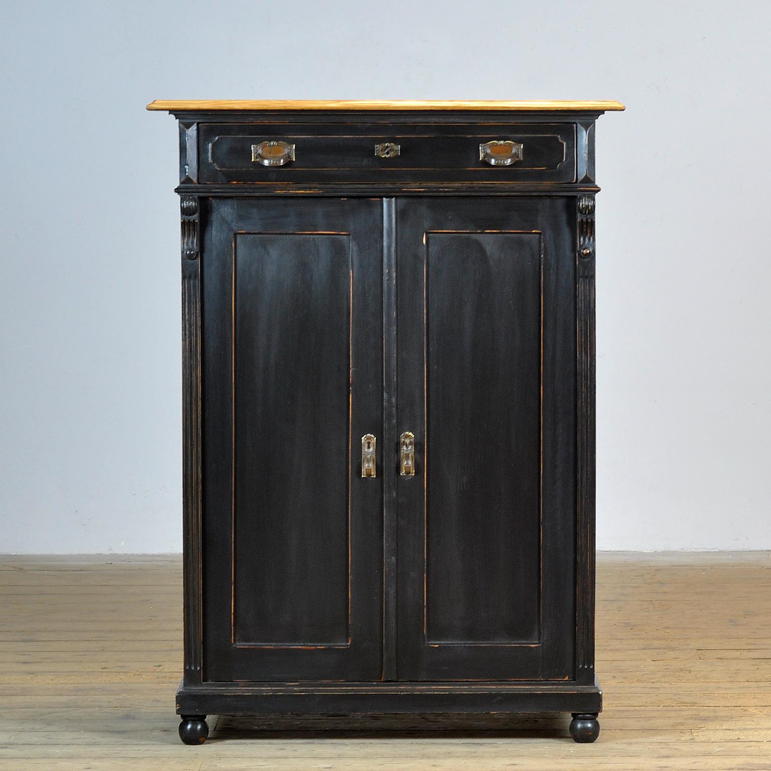 Cabinet made of a combination of oak, pine and plywood. The cabinet was made in the 1930s in Hungary. The cabinet has its original fittings.