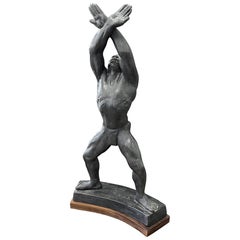 "Homme noir aux bras levés, sculpture de nu africain par Fenton