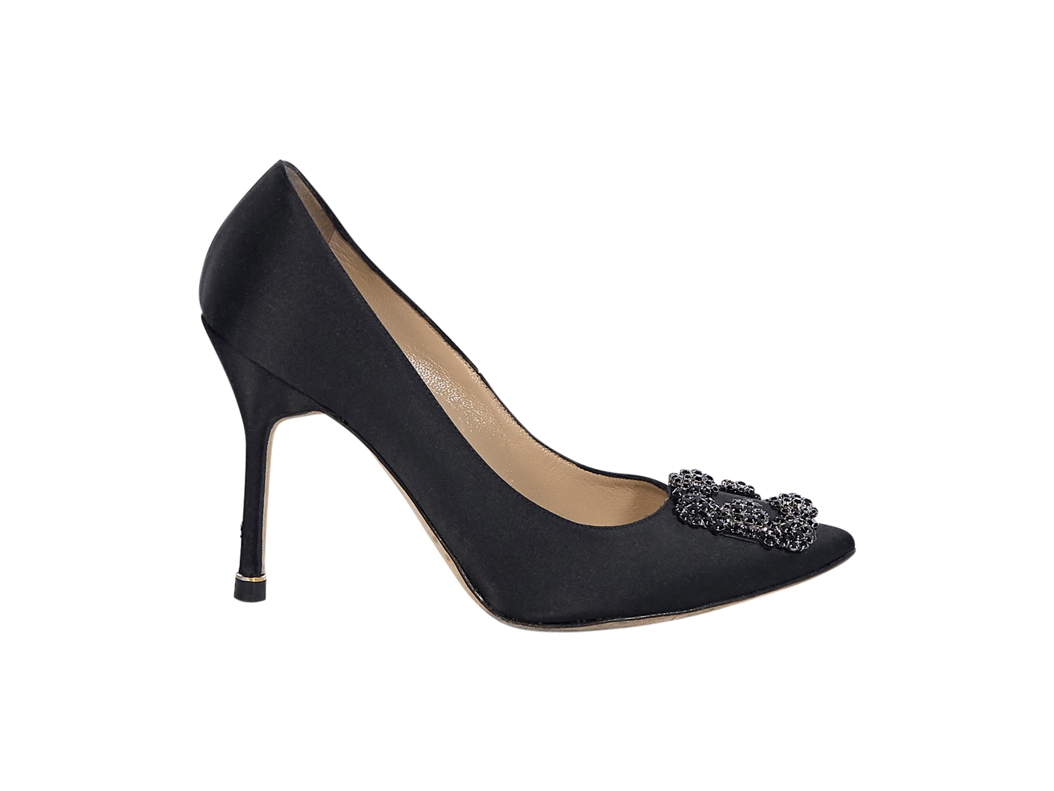 Product details: Black crystal-embellished satin pumps by Manolo Blahnik.  Pointed-toe. Stiletto heel. Slip-on style. Wear with a silk slip dress. Label size IT 38. 4