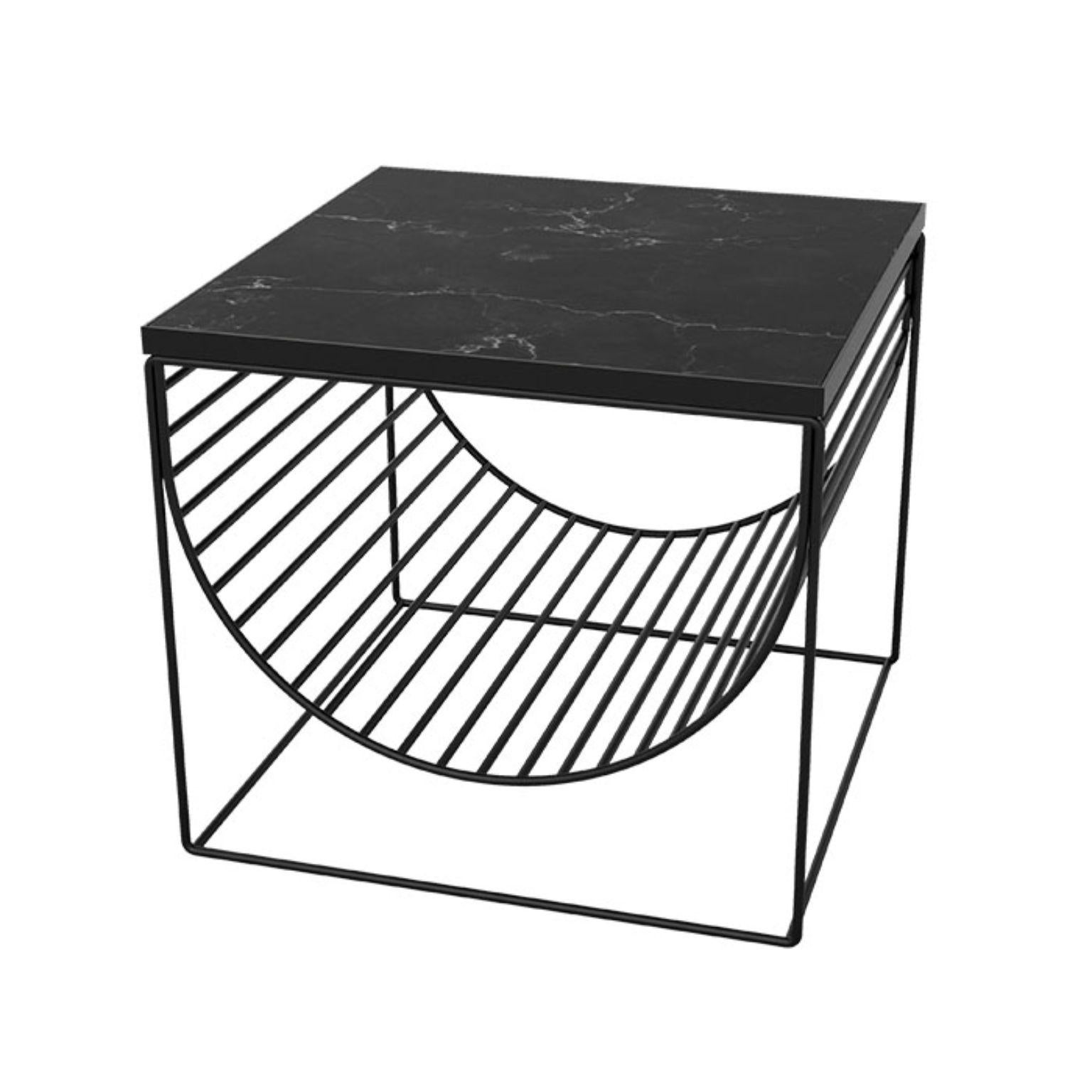 Black marble and steel side table
Dimensions: L 50 x W 50 x H 44.3 cm
Materials: Marble, steel  

This series consists of three different designs that you can combine in many different ways. The table tops come in two different colored luxurious