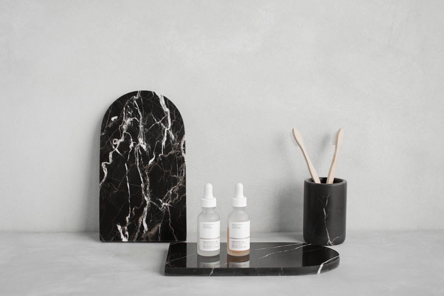 This multi-use arched black marble platter with natural veining makes a sophisticated presentation of appetizers, cheese, breads and crackers. This beautiful marble platter will be noticed by your guests. It is also perfect to use in your bathroom