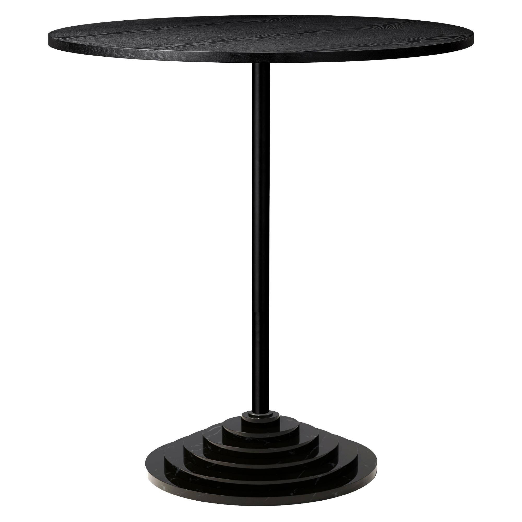 Black marble base and steel high table.
Dimensions: Ø 70 x H 74 cm
Materials: Steel frame, marble base and veneer

Elegant table with a heavy marble base which creates an unique look.