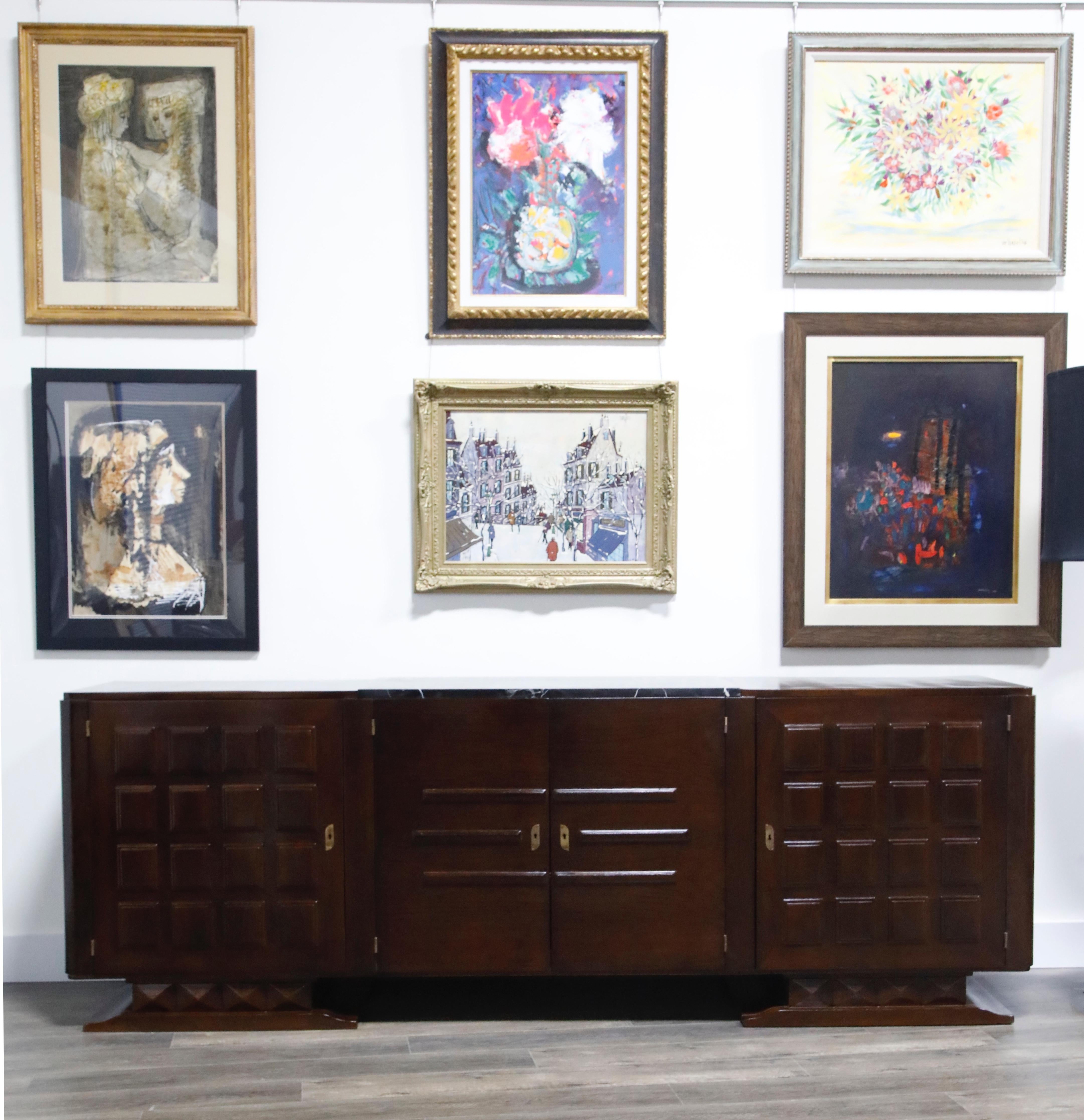 Grand, stately looking, custom French Art Deco credenza by Gaston Poisson. This piece is crafted from dark walnut, Portoro marble, and bronze, which excellently examples the skilled craftsmanship and opulence of the Art Deco movement.

Portoro is a