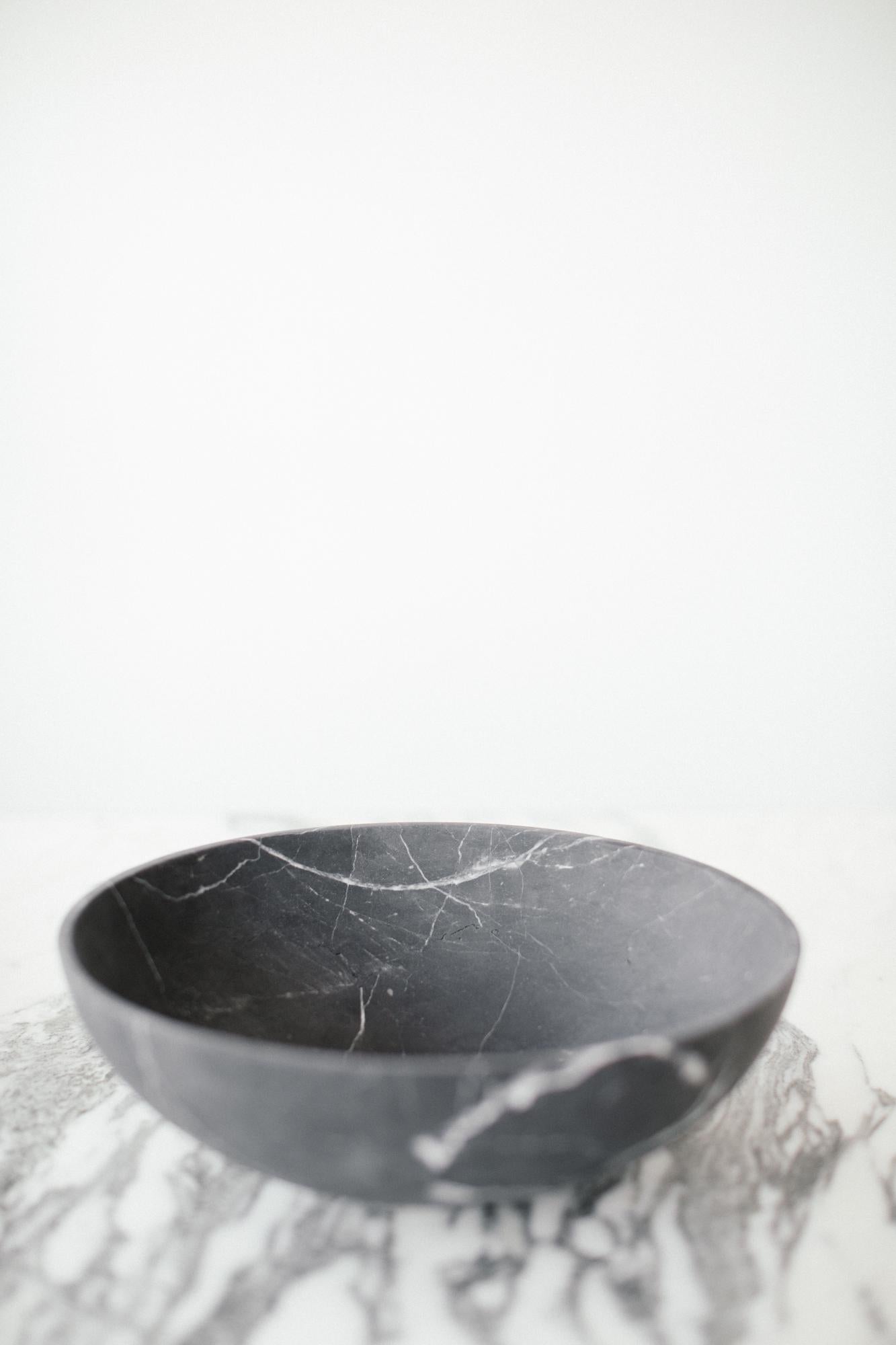 large black bowl carved