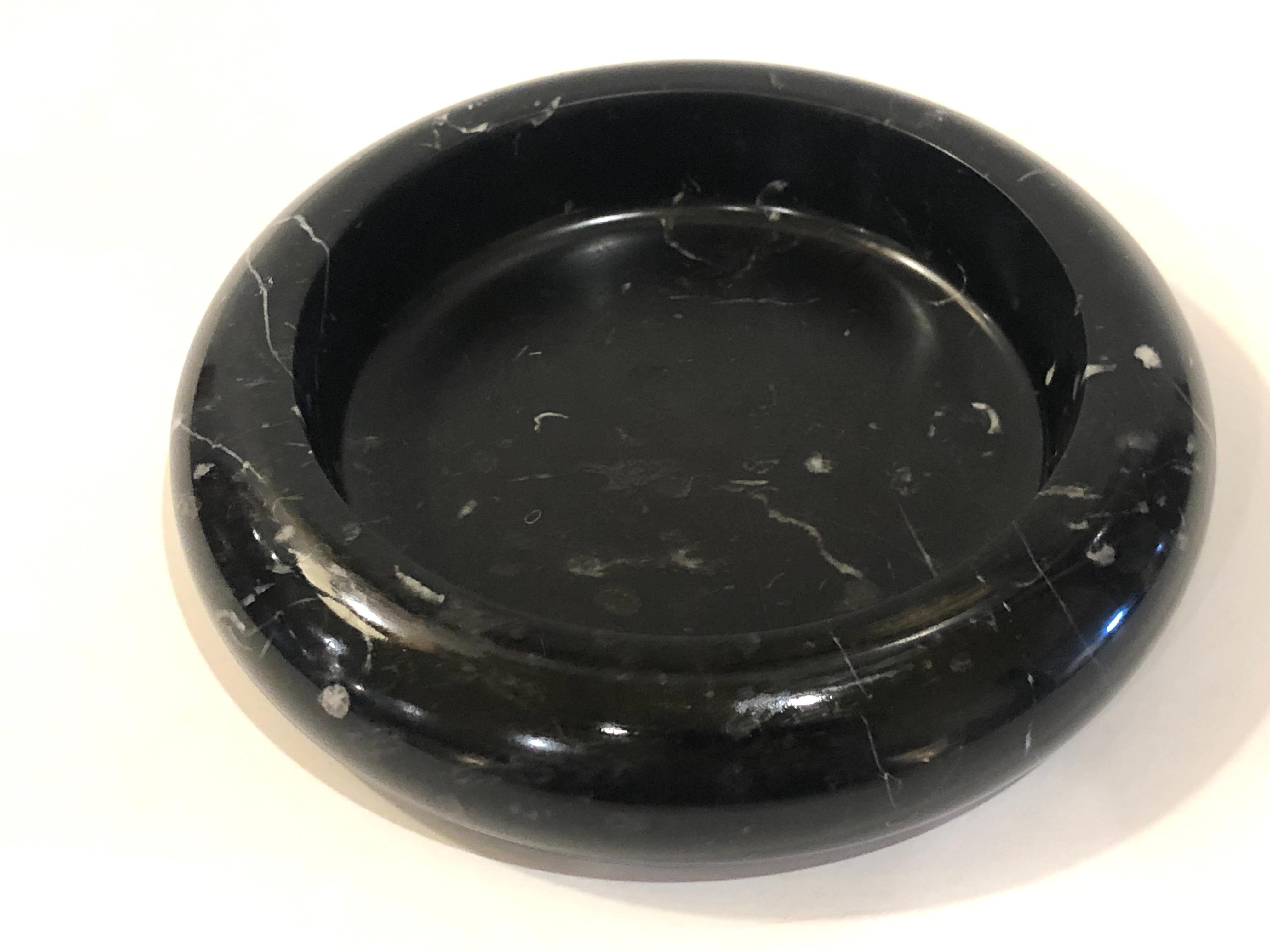 Beautiful petite cendrier or low candy dish bowl, circa 1960s in black marble nice condition some light wear in the center no scratches just a dull finish due to age.