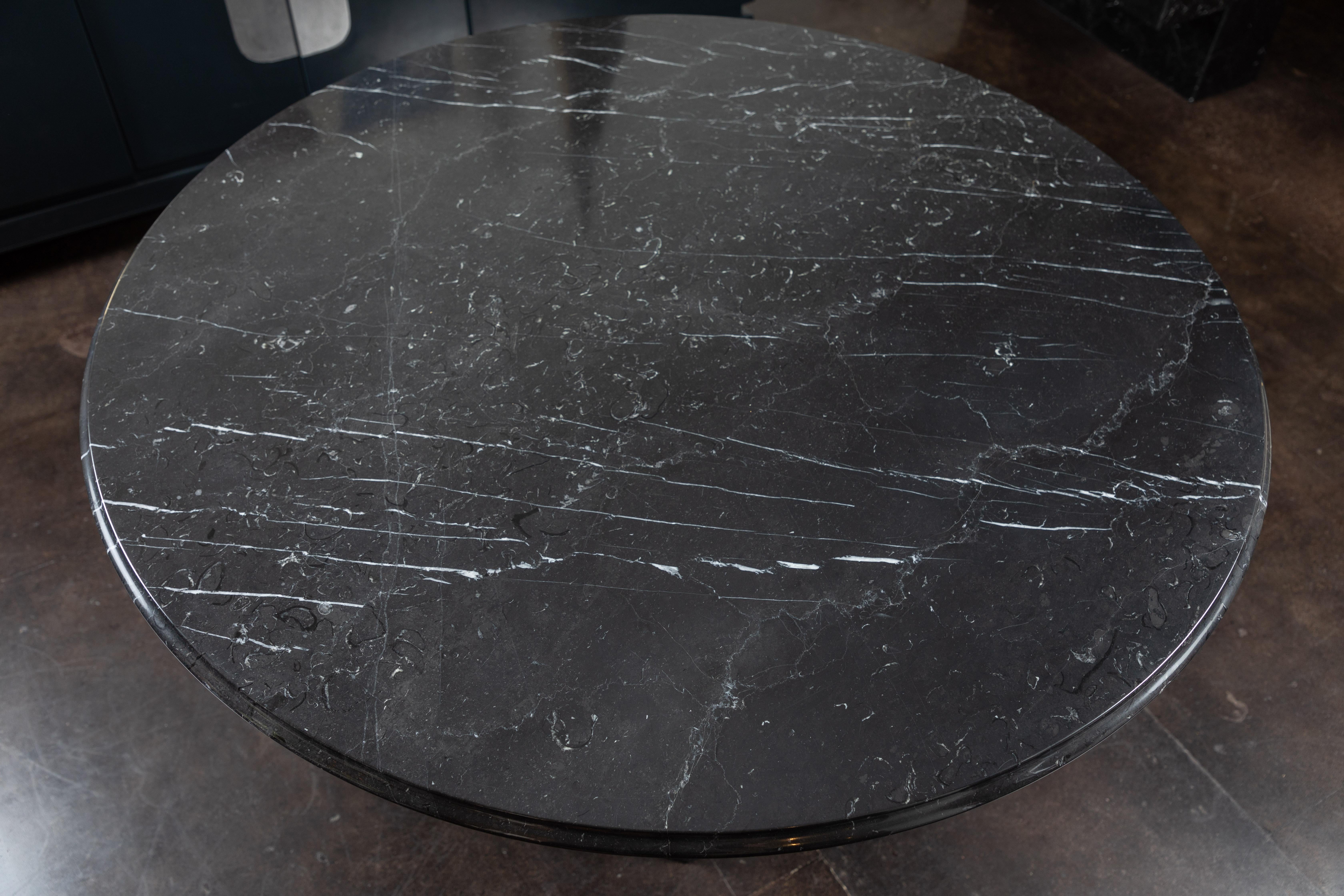 Lovely and versatile table in Nero Marquina marble, early 1990s. Can be used as a dining table or centre table. Excellent condition, no cracks or chips. The table has been professionally polished.