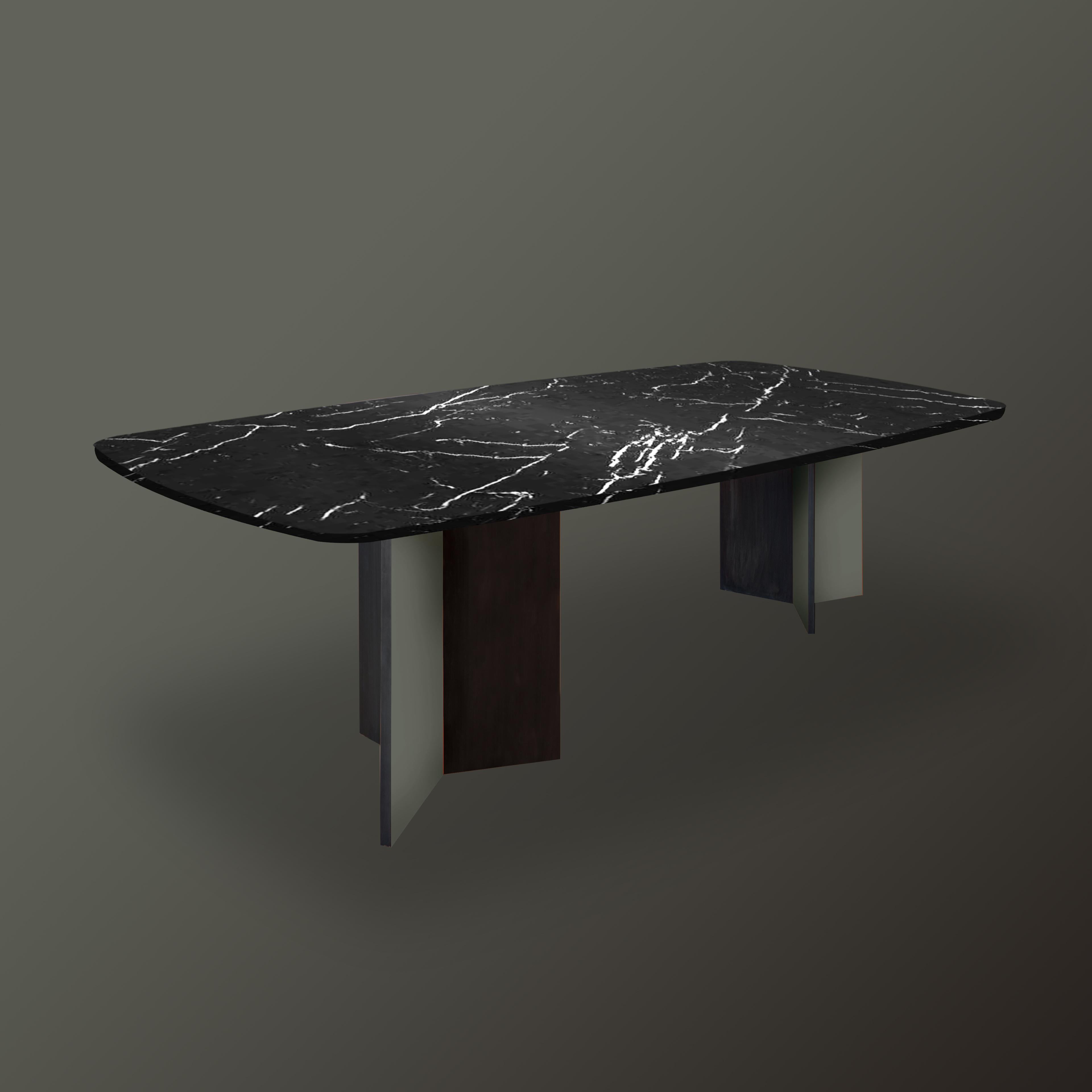 Note that the pattern of the stone will vary as it's a natural stone.

Materials: Spray painted legs, Marquina marble top (Different colours available on request)

The table dimensions permit to seat 8 people – W 200 x D 110 x H 75 cm

The table top