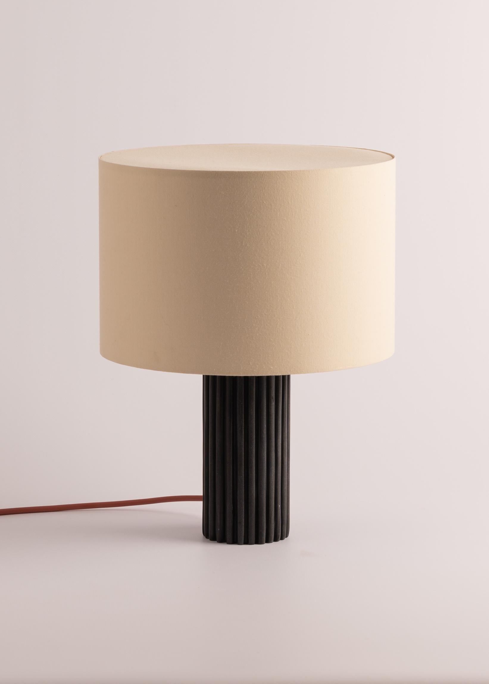 Black Marble Flutita Table Lamp by Simone & Marcel
Dimensions: Ø 30 x H 40 cm.
Materials: Cotton and black marble.

Also available in different marble and wood options and finishes. Custom options available on request. Please contact us. 

All our