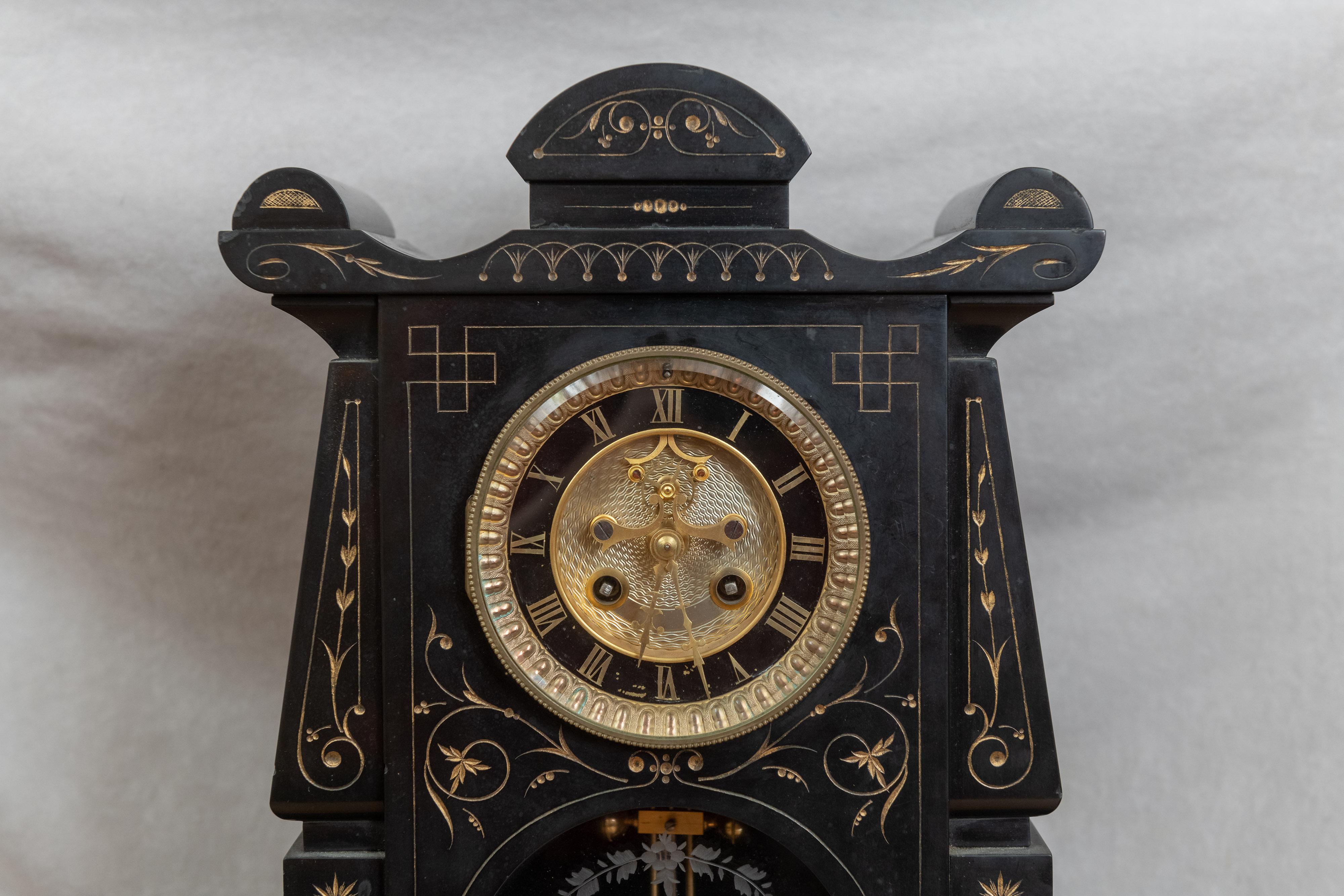 I see black marble clocks all the time in my over 40 years of a shop, and I buy clocks on occasion. One thing I never buy is black marble clocks because they are usually bland. This one seriously grabbed my attention. Just look at the incised gilt