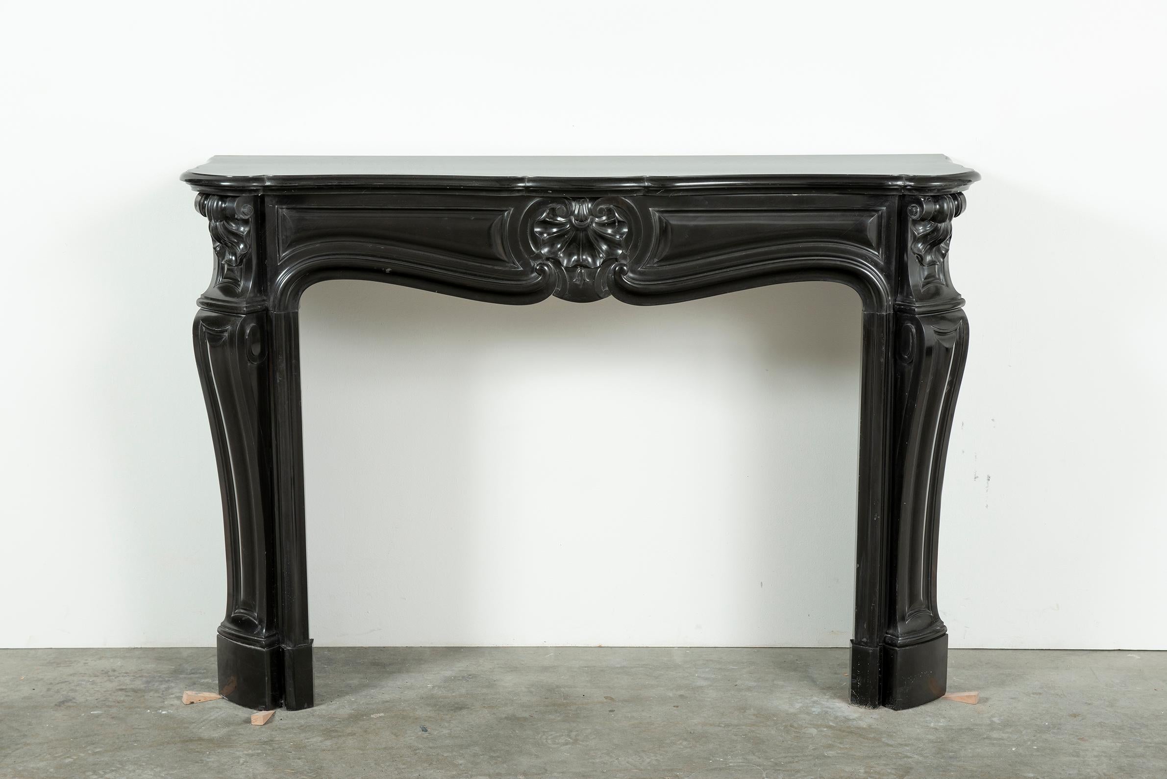French Black Marble Louis XV Fireplace Mantel, 19th Century For Sale