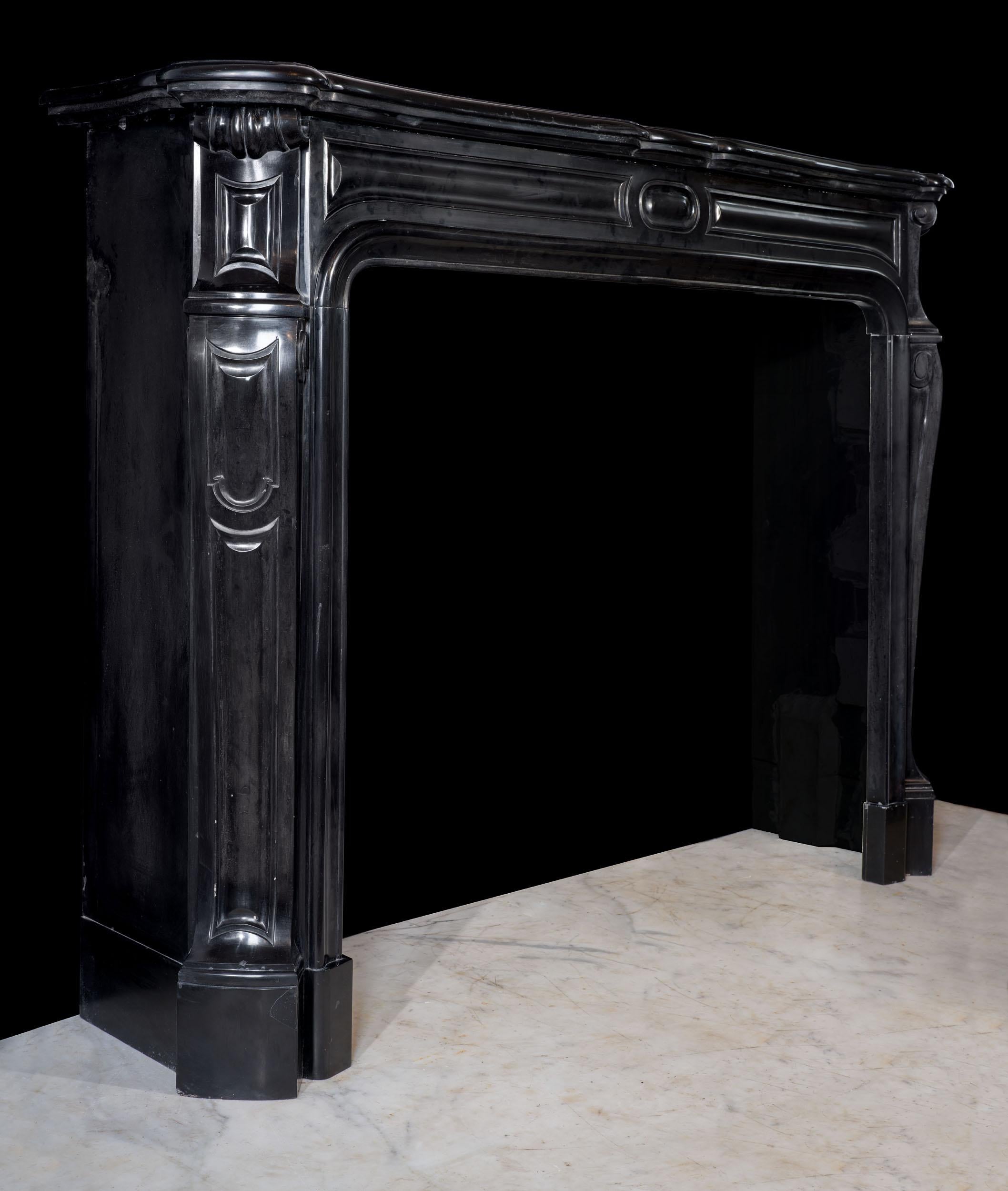 French Black Marble Louis XV Fireplace Mantel  For Sale