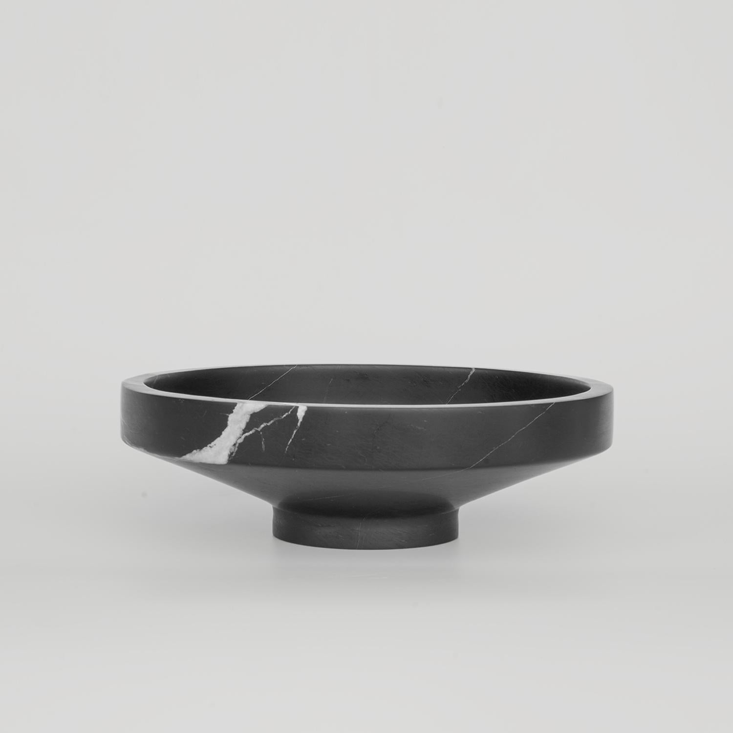Introducing our exquisite black marble narrow bowl, a fusion of elegance and functionality. Crafted from luxurious black marble with, this stunning bowl is a testament to timeless beauty and sophistication. Whether displayed as a decorative accent