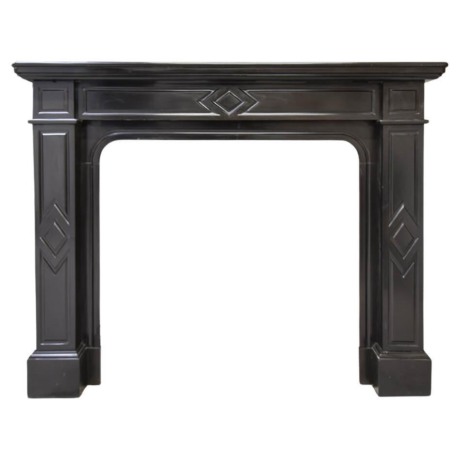 Black marble Noir de Mazy fireplace mantel 19th Century For Sale