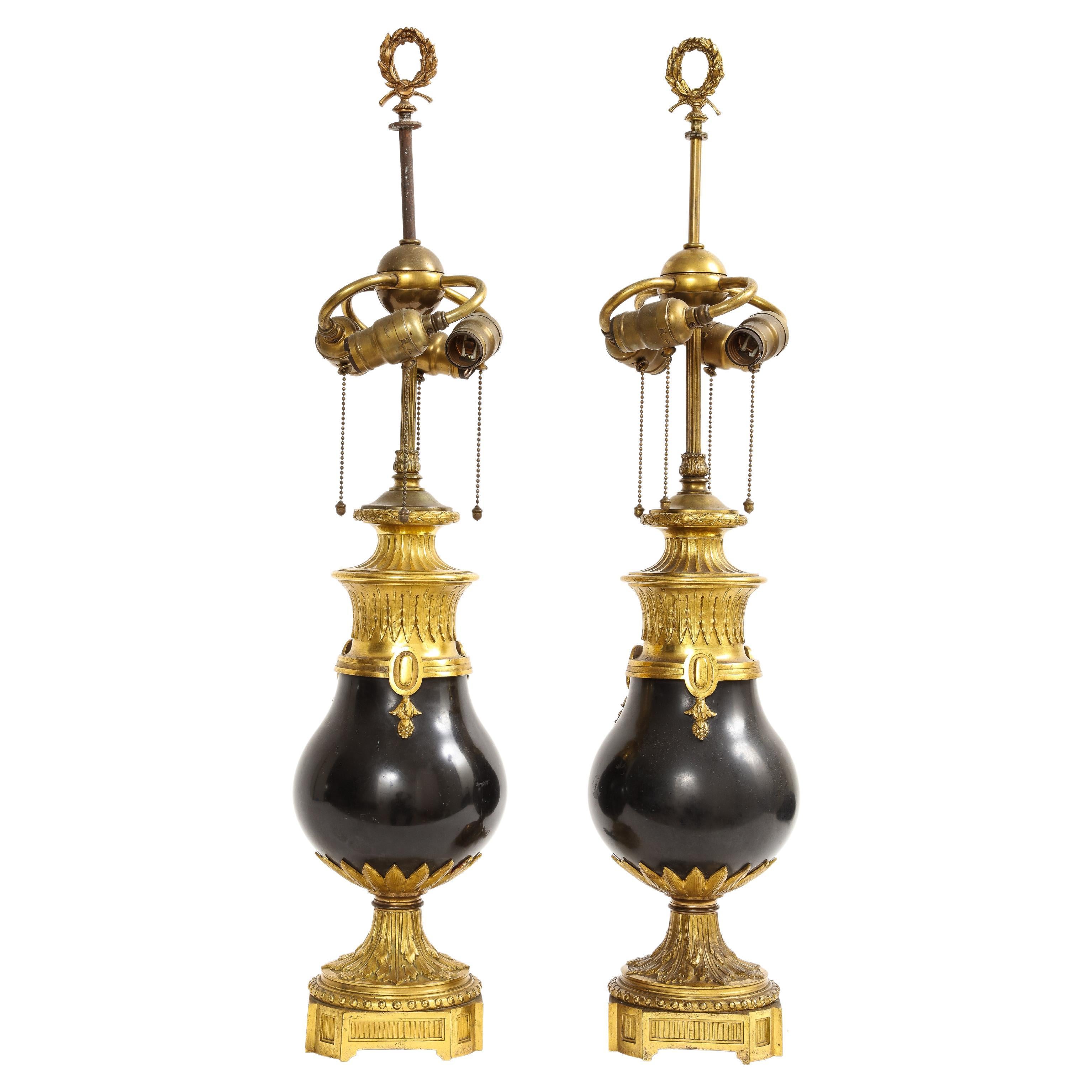 Lampes Caldwell montées sur marbre noir et bronze doré, années 1800
