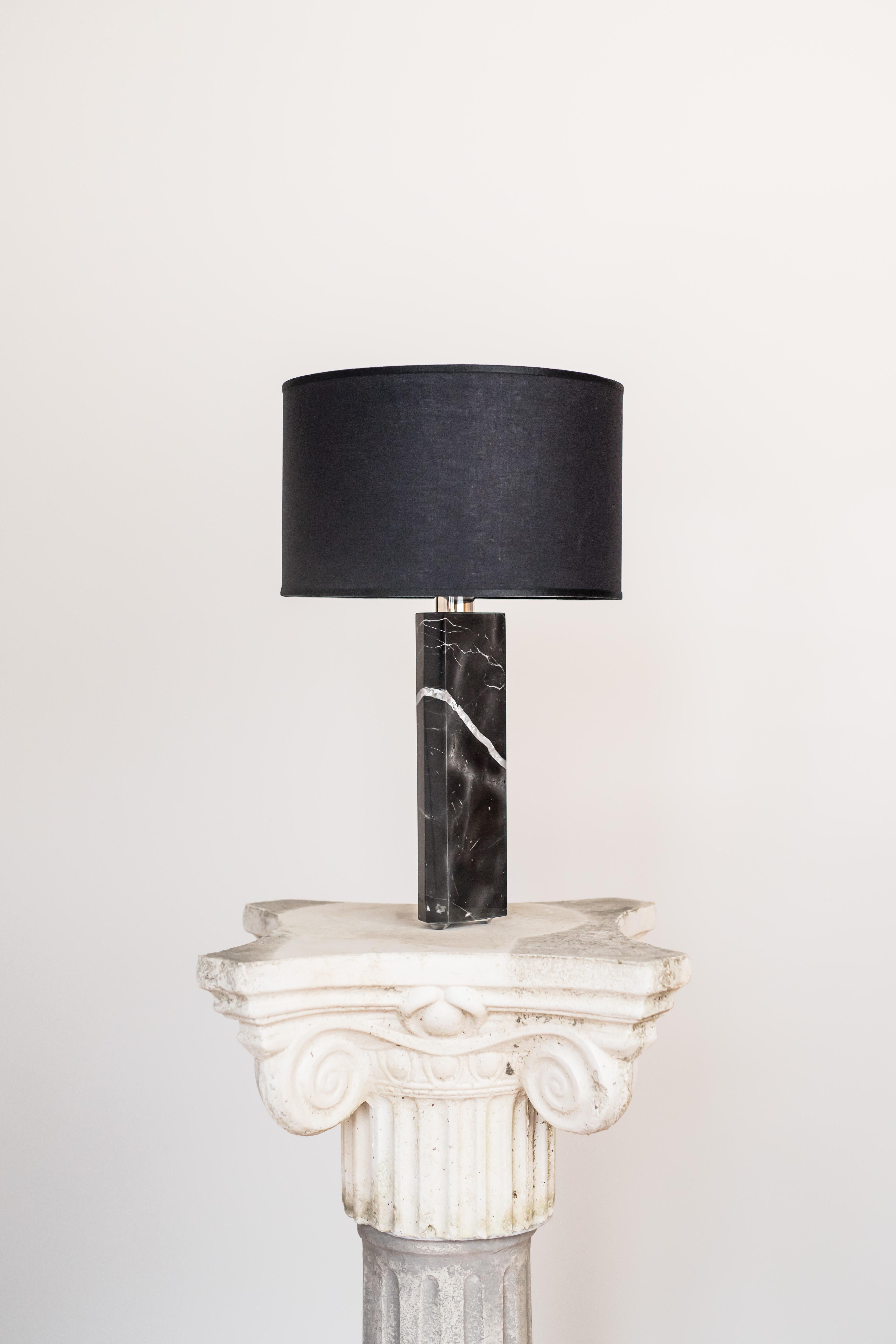 Black marble sculpted table lamp by brajak vitberg
Black marble
Dimensions: 52 x 35 x 35 cm
White or black cotton lampshade, cotton wiring

Bijelic and Brajak are two architects from Ljubljana, Slovenia.
They are striving to design craft