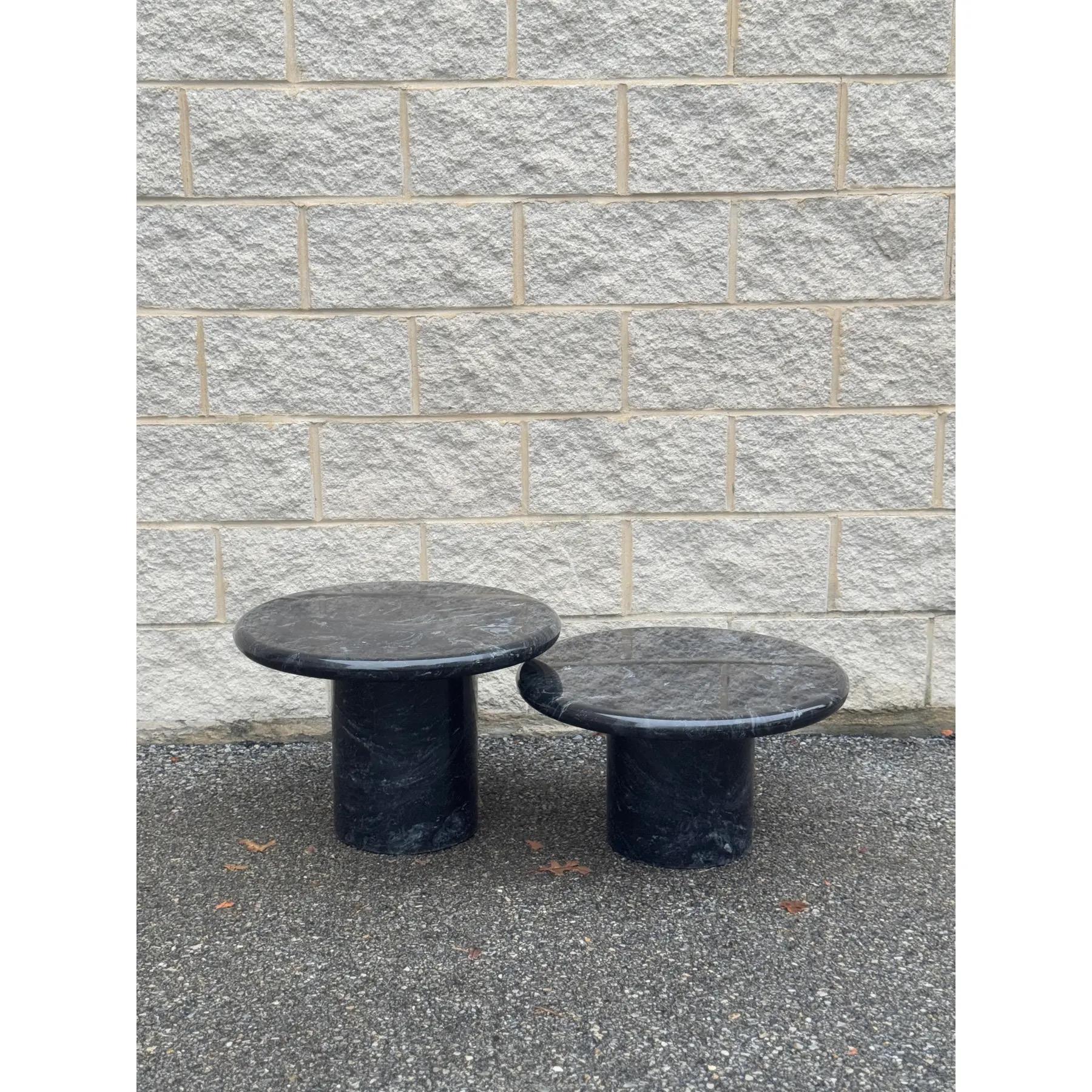 Set of 2 mushroom marble tables, perfect as a coffee table or side tables. The taller one is 14.5” tall, the shorter one is 12” tall. 

