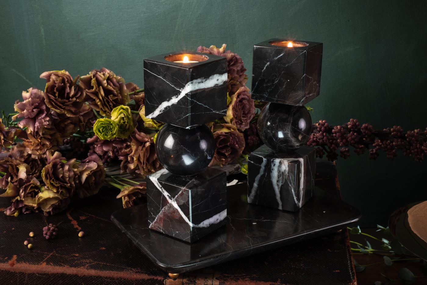 Elevate your ambiance with the captivating allure of bruci's Totem Candle Holders, a sublime sculptural masterpiece destined to adorn any refined setting. This decorative set, meticulously crafted by skilled artisans, transcends conventional