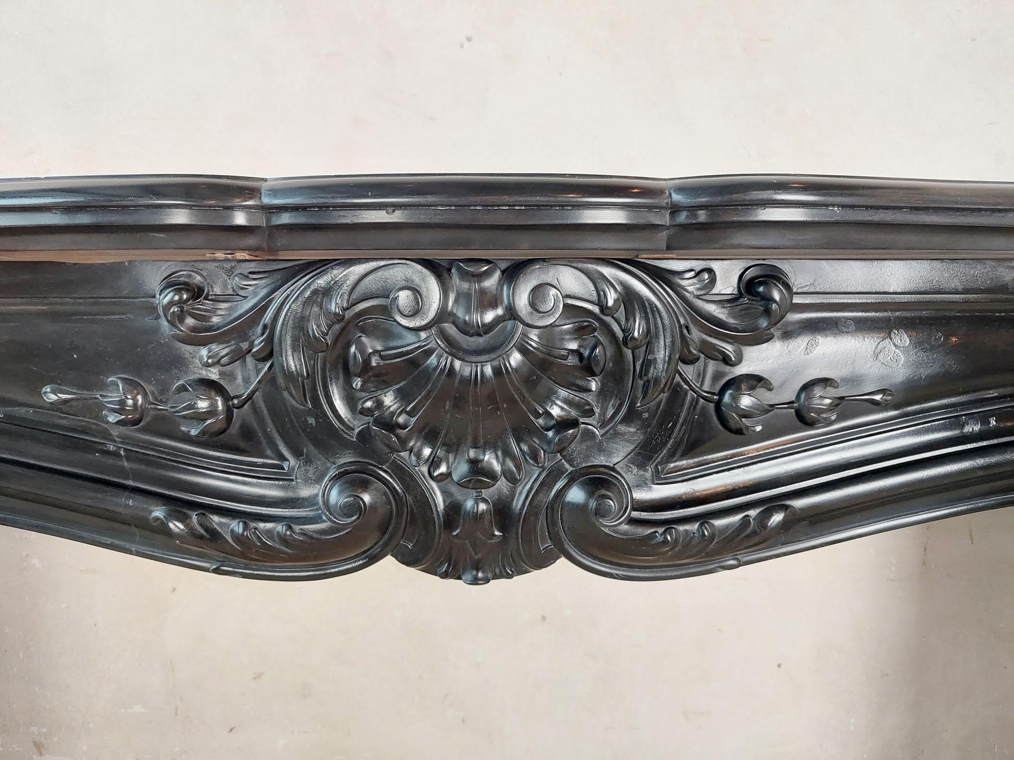 19th Century Black marble trois coquilles mantelpiece For Sale