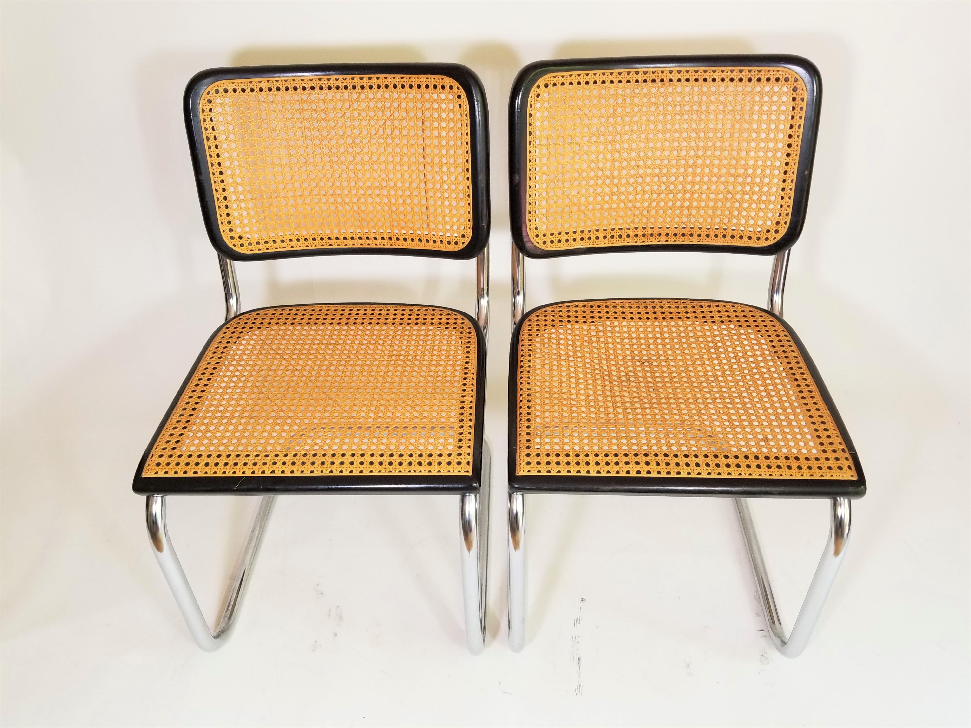 Midcentury Marcel Breuer chairs by Thonet aquired from the original owner who purchased them in 1960s. Caning intact and nicely aged caramel color. Black finish. Classic Chrome tubular frames. 

Complimentary delivery in NYC and surrounding areas