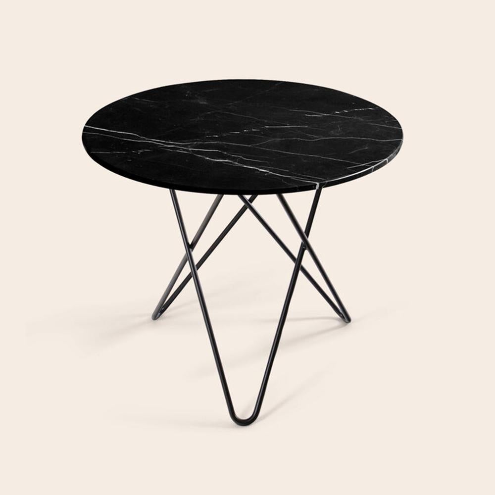Black Marquina Marble and Black Steel Dining O Table by OxDenmarq
Dimensions: D 80 x H 72 cm
Materials: Steel, Black Marquina Marble
Also Available: Different marble and frame options available,

OX DENMARQ is a Danish design brand aspiring to