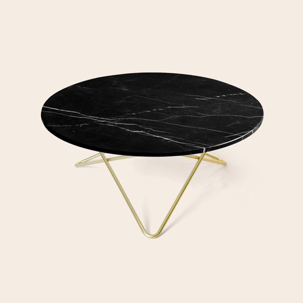 Black Marquina Marble and Brass Large O Table by OxDenmarq
Dimensions: D 100 x H 40 cm
Materials: Brass, Black Marquina Marble
Available in other size. Different top and frame options available,

OX DENMARQ is a Danish design brand aspiring to