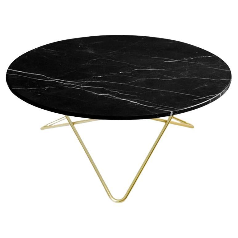 Grande table O en marbre noir Marquina et laiton par OxDenmarq