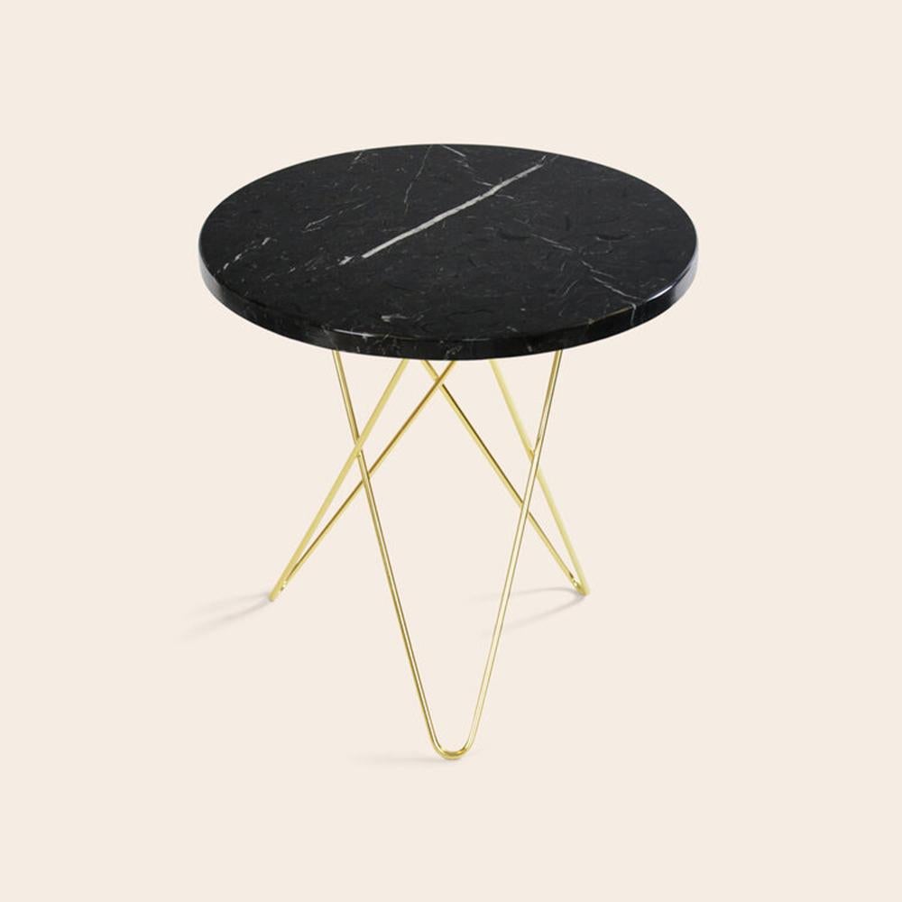 Black Marquina Marble and Brass Tall Mini O Table by OxDenmarq
Dimensions: D 50 x H 50 cm
Materials: Brass, Black Marquina Marble
Also Available: Different top and frame options available,

OX DENMARQ is a Danish design brand aspiring to make