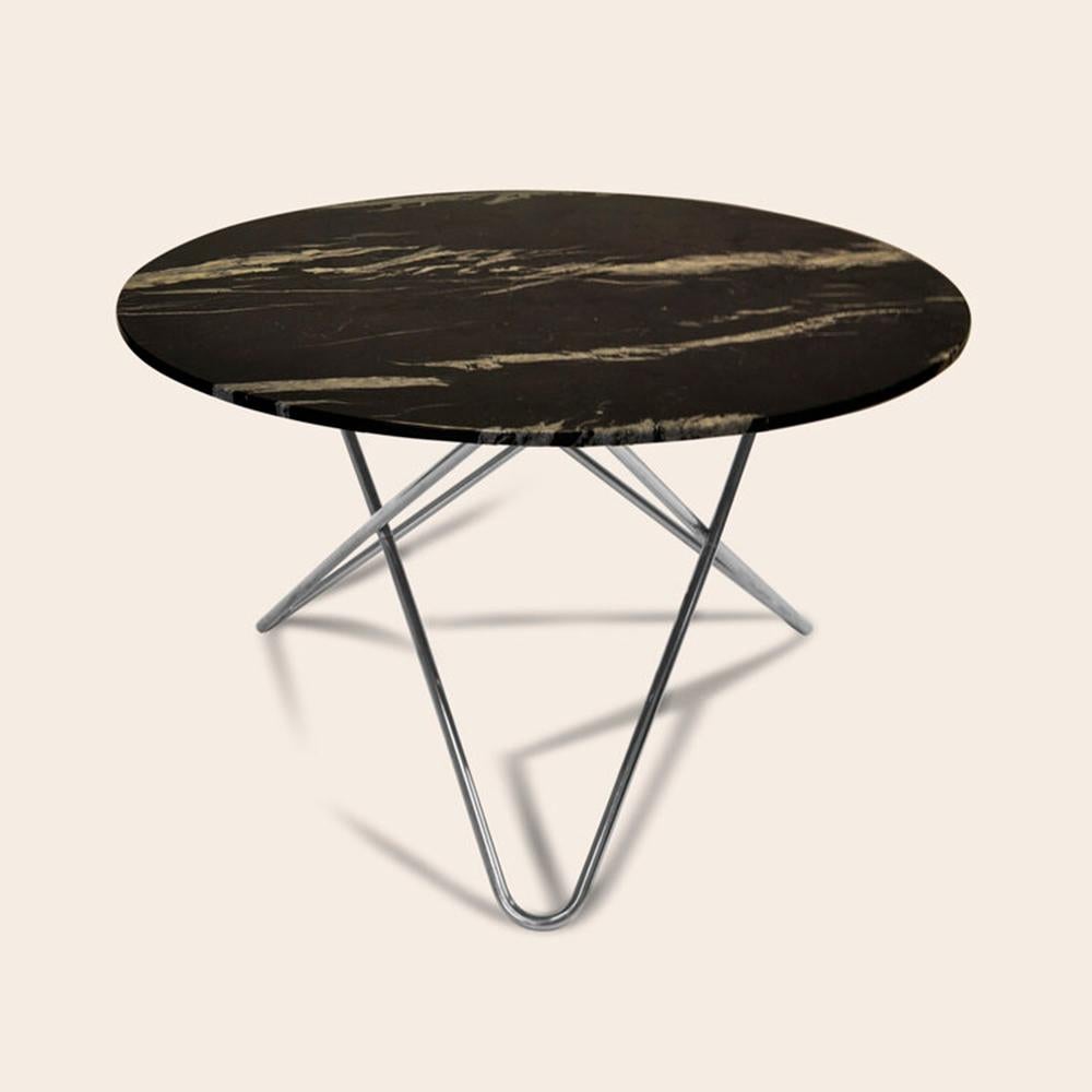 Black Marquina marble and stainless steel big o table by OxDenmarq
Dimensions: D 120 x H 72 cm
Materials: Steel, black marquina marble
Also available: Different marble and frame options available

OX DENMARQ is a Danish design brand aspiring to
