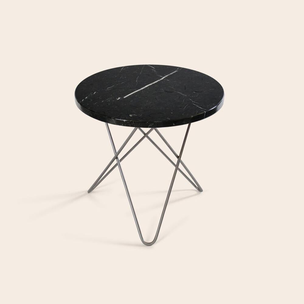 Black Marquina Marble and Steel Mini O table by OxDenmarq
Dimensions: D 40 x H 37 cm
Materials: Steel, Black Marquina Marble
Also Available: Different top and frame options available.

OX DENMARQ is a Danish design brand aspiring to make