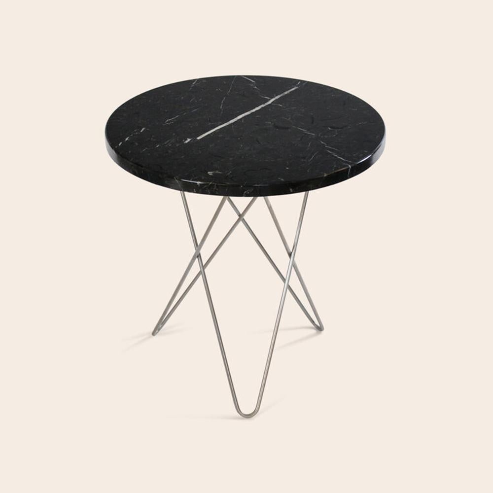 Black Marquina marble and steel tall Mini O table by OxDenmarq
Dimensions: D 50 x H 50 cm
Materials: Steel, Black Marquina Marble
Also Available: Different top and frame options available.

OX DENMARQ is a Danish design brand aspiring to make