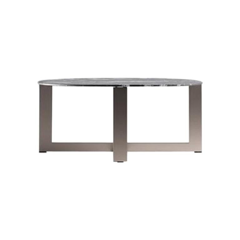 Black Marquina coffee table by Nicola Gallizia. Expert-crafted in Italy exclusively by Molteni&C.

This coffee table is part of the Domino series by Nicola Gallizia. Characterized by its black marble top with a steel base and pewter finish, it can