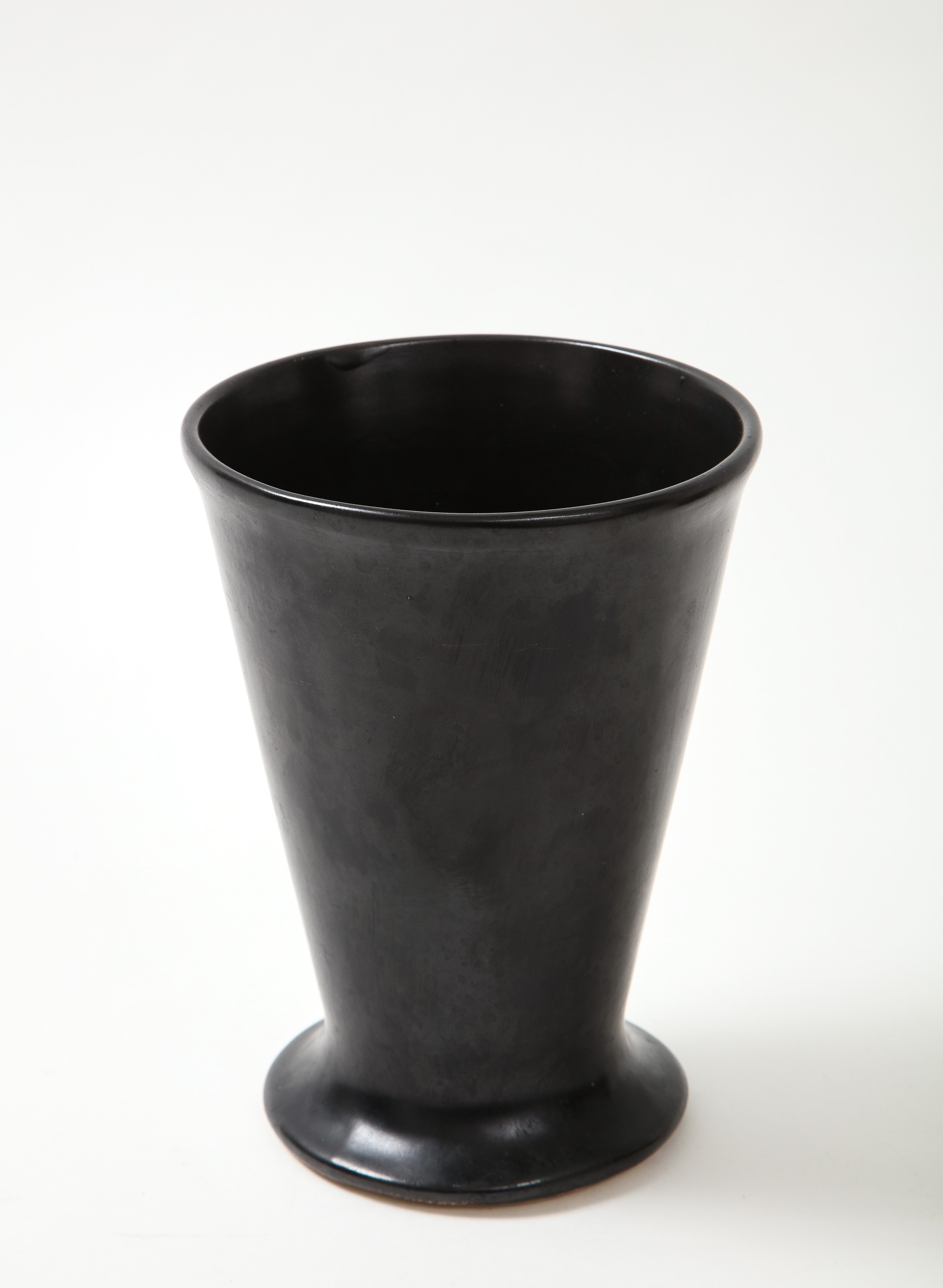 Black matte vase in the manner of Georges Jouve, France, c. 1960.
