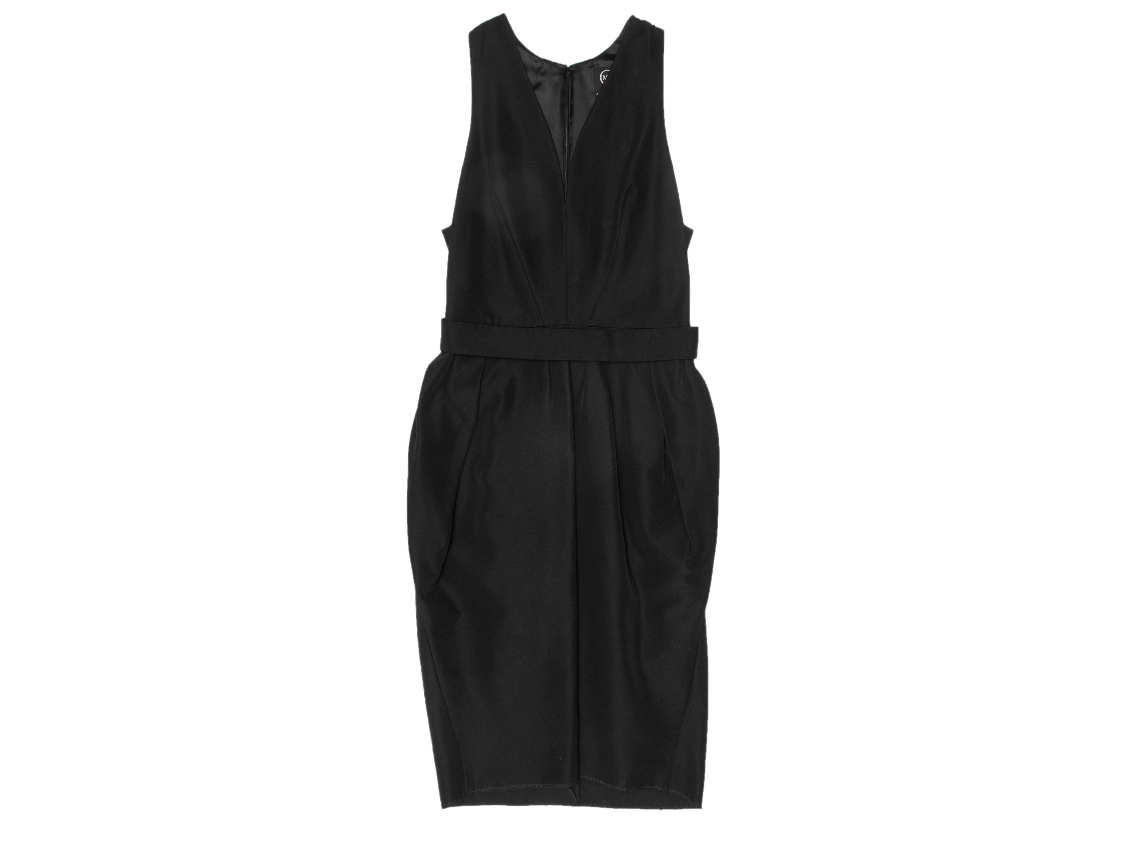 Product Details: Black sleeveless black sheath dress by McQ Alexander McQueen. V-neck. Zip closure at back. 32