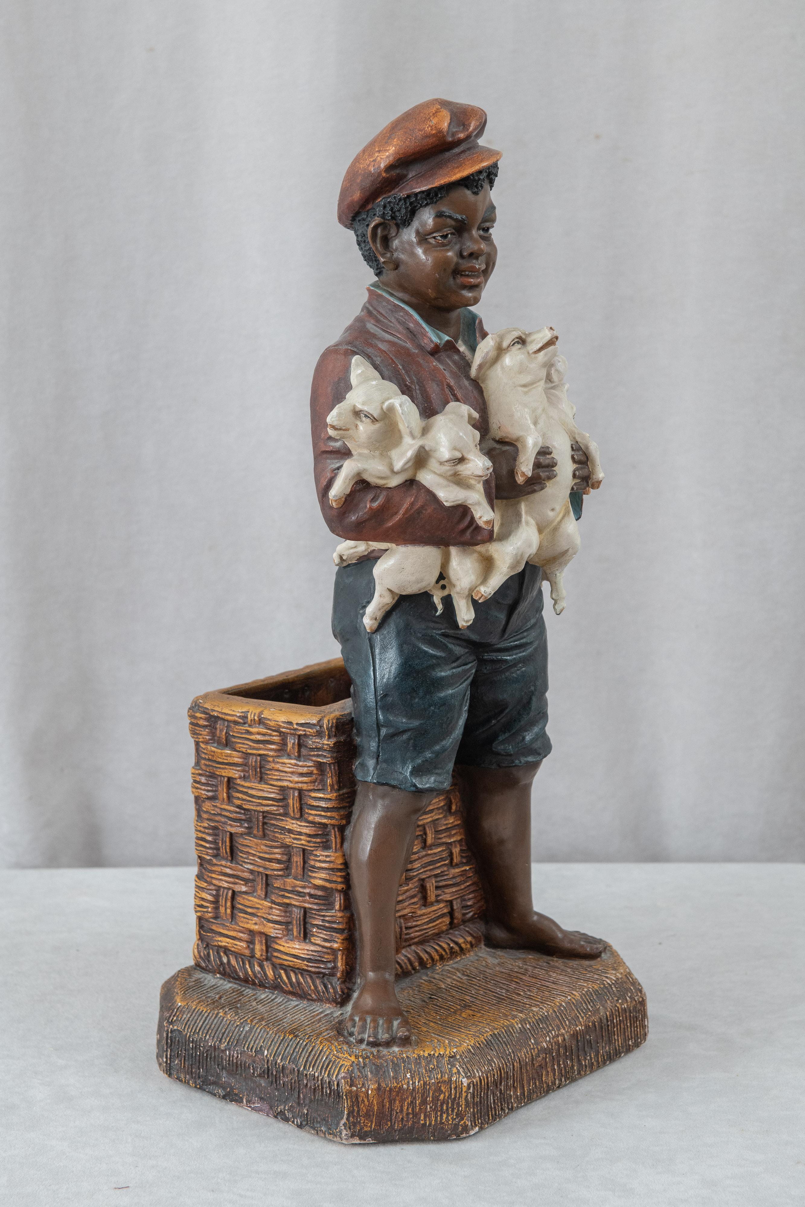 Black Memorabilia, Young Barefoot Boy Holding Baby Pigs, ca.1910, American In Good Condition For Sale In Petaluma, CA
