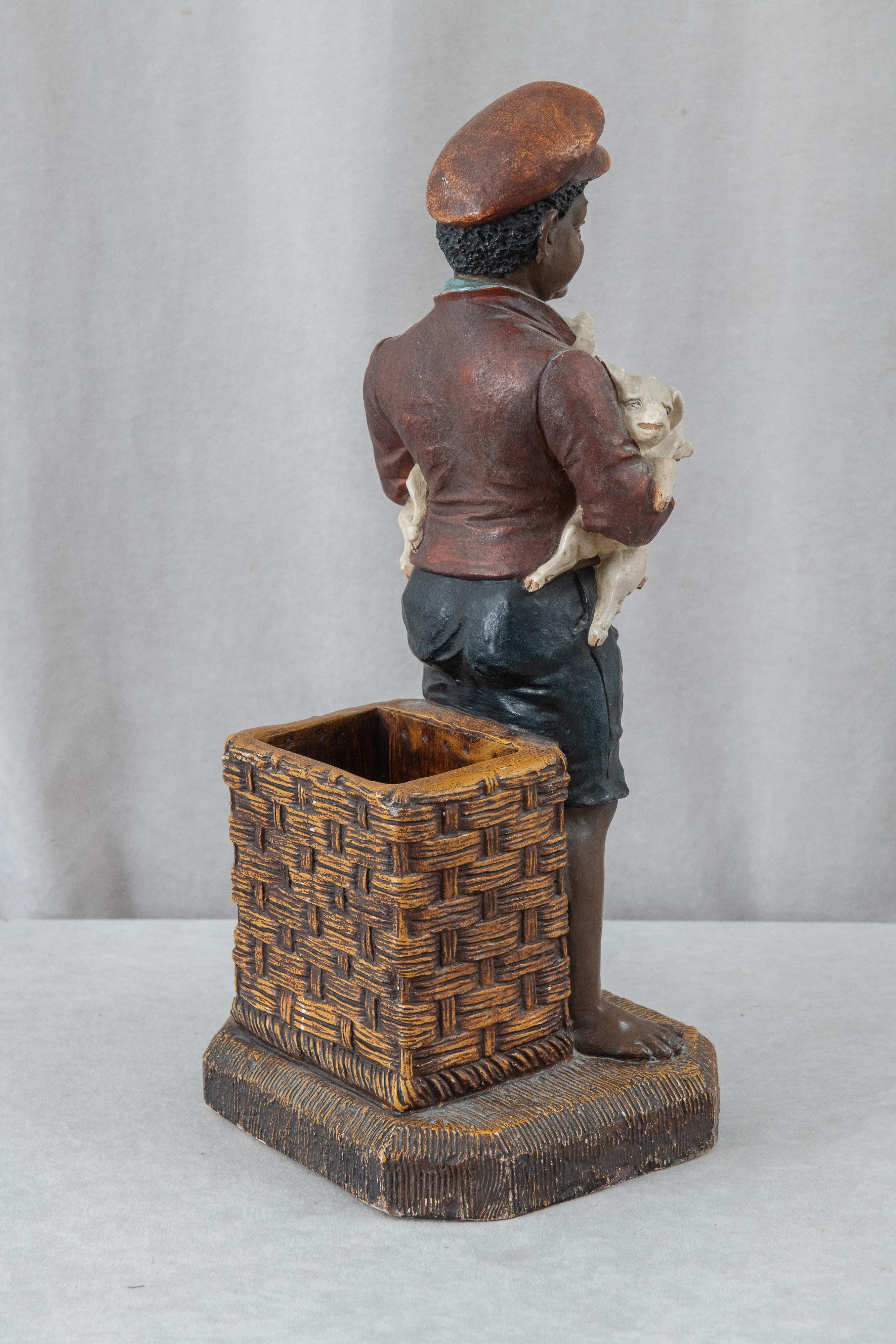 Plaster Black Memorabilia, Young Barefoot Boy Holding Baby Pigs, ca.1910, American For Sale