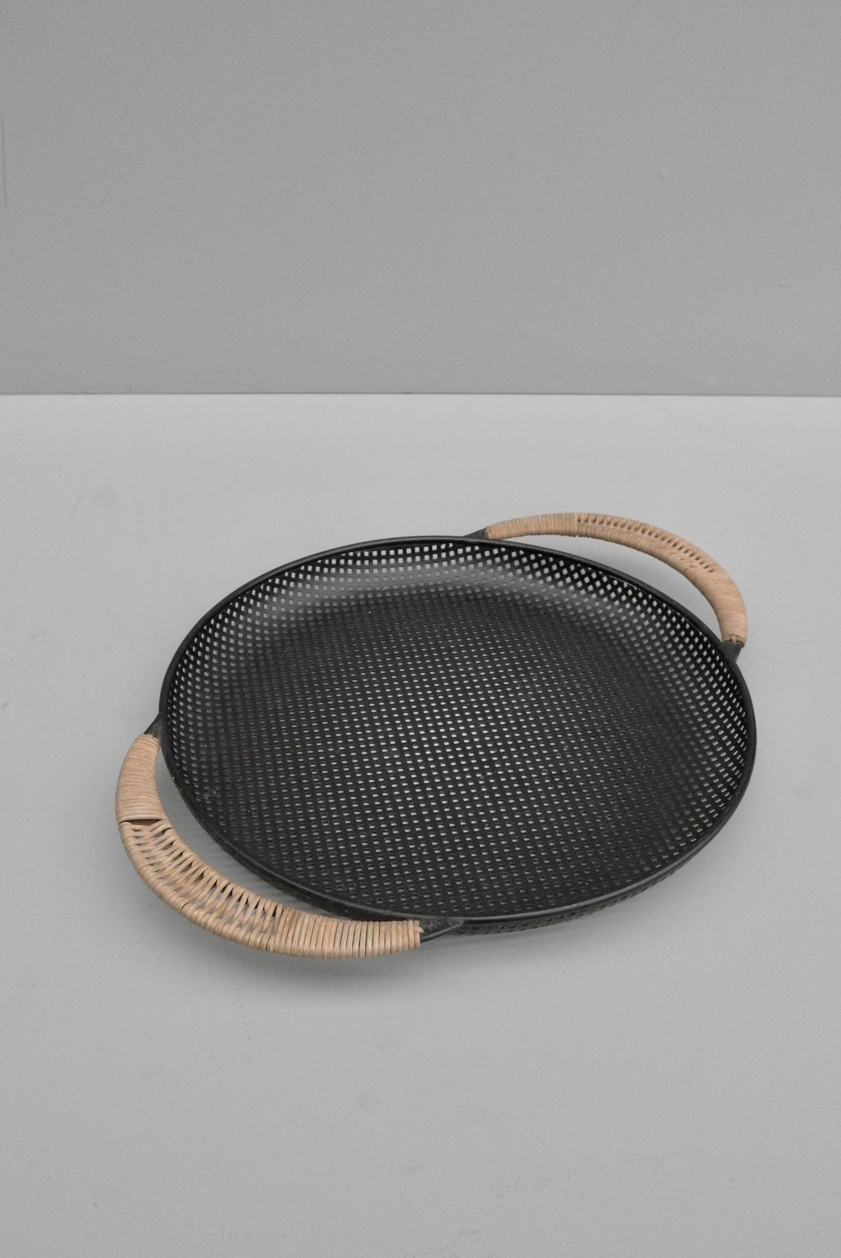 Black metal Rotin tray designed by Mathieu Matégot. Manufactured by Ateliers Matégot, France, circa 1950. Lacquered perforated metal with rattan details.