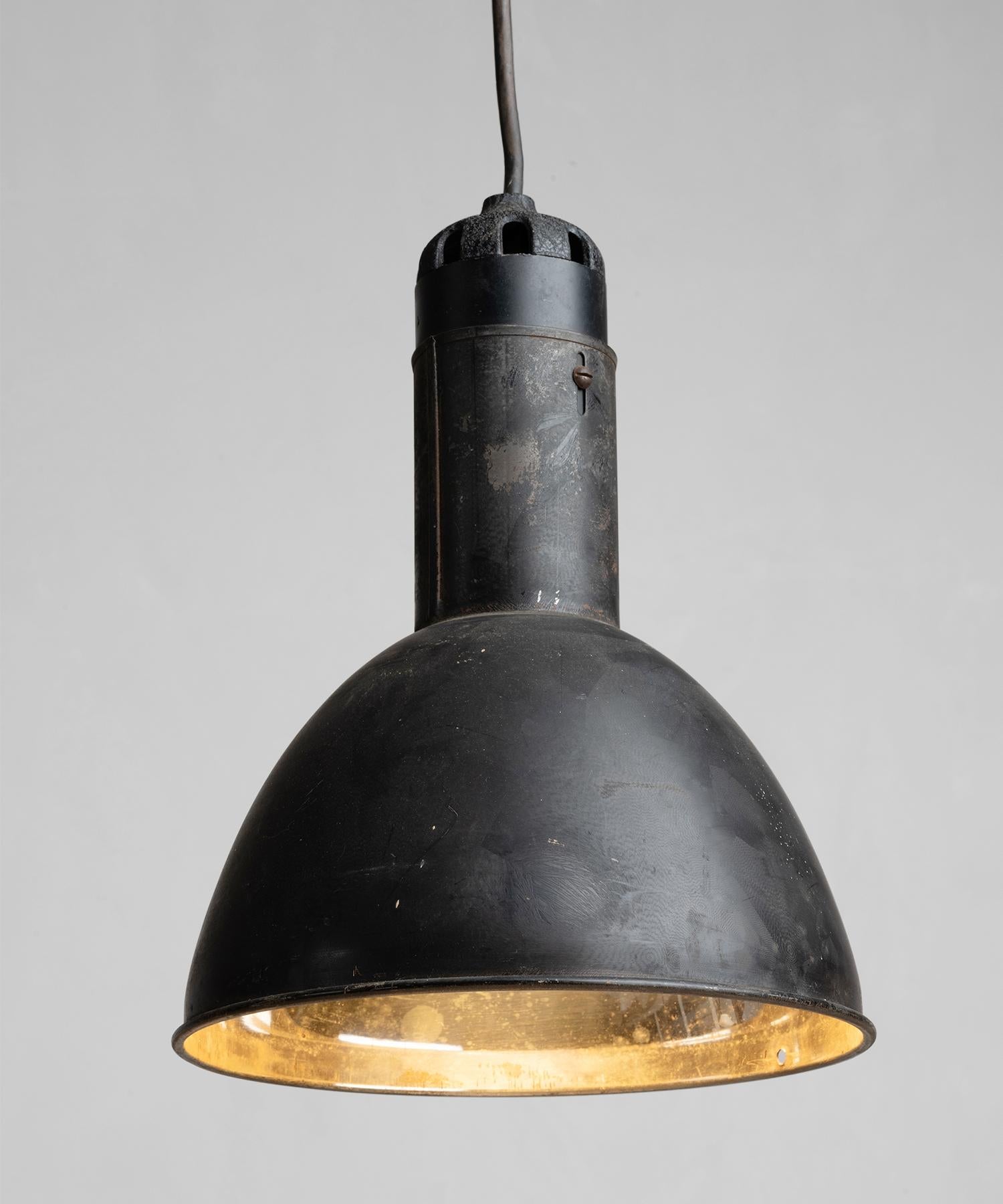 Unique pendant lamp with mercury glass silver lining.