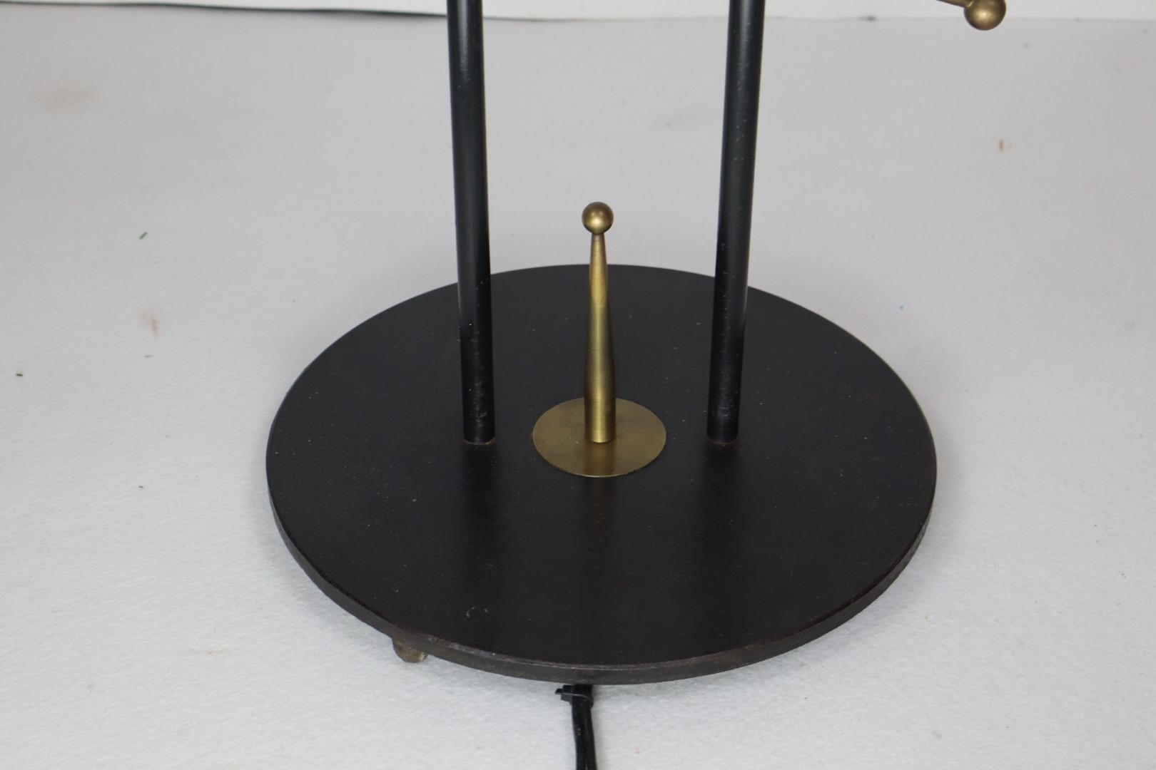 Mid-20th Century Black metal lacquered and brass floor lamp, Maison Lunel, 1960s