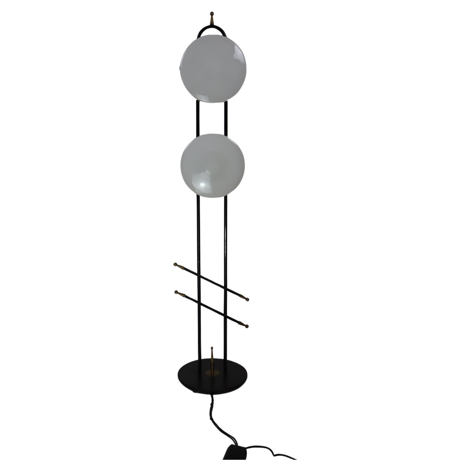 Black metal lacquered and brass floor lamp, Maison Lunel, 1960s