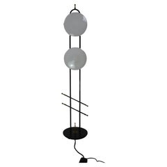 Black metal lacquered and brass floor lamp, Maison Lunel, 1960s