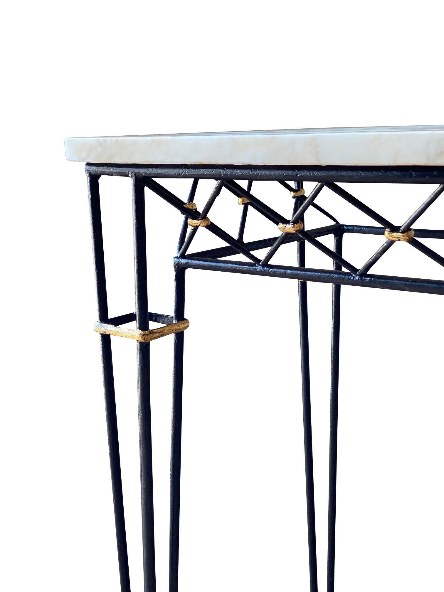 Mid century Italian console designed by Maurizio Tempestini.
Black metal with gold gilt metal accents.
White marble top.
Coordinating mirror also available ( P1310 )
see image #6.
 