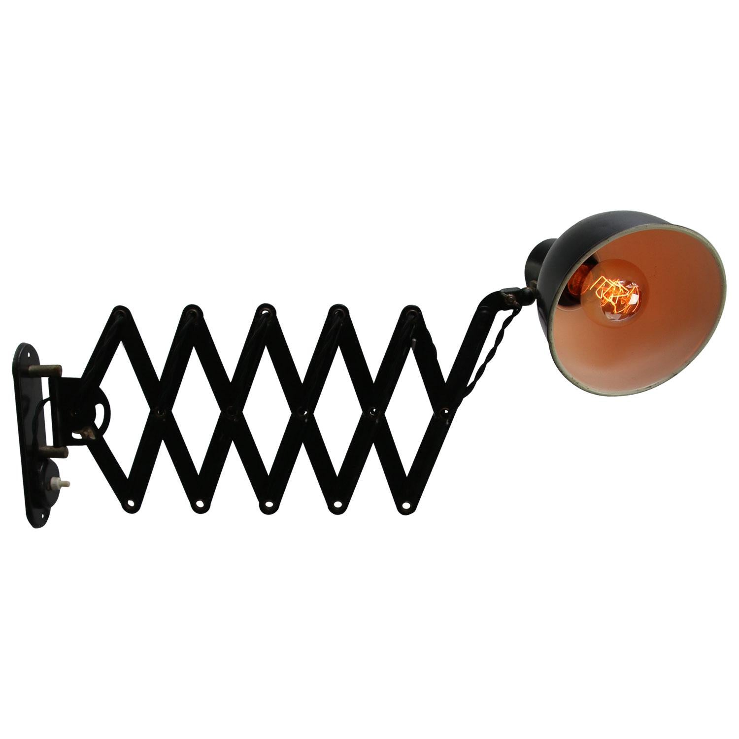 Scissor wall lamp
Black metal shade and white interior adjustable length and horizontally and vertically swiveling arm

shade size: diameter 16 cm
90° angle adjustable shade

as shown on picture: 65 cm
min length 39 cm
max length 100