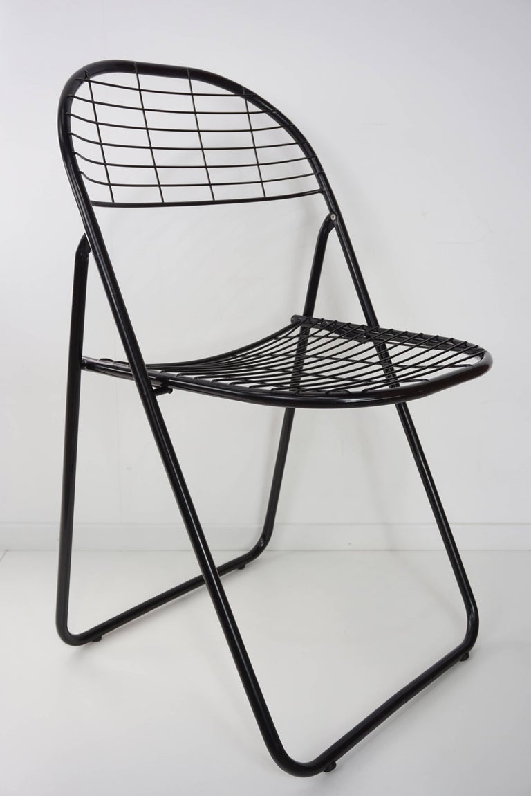 Black Metal Set of Four Folding Chairs at 1stDibs