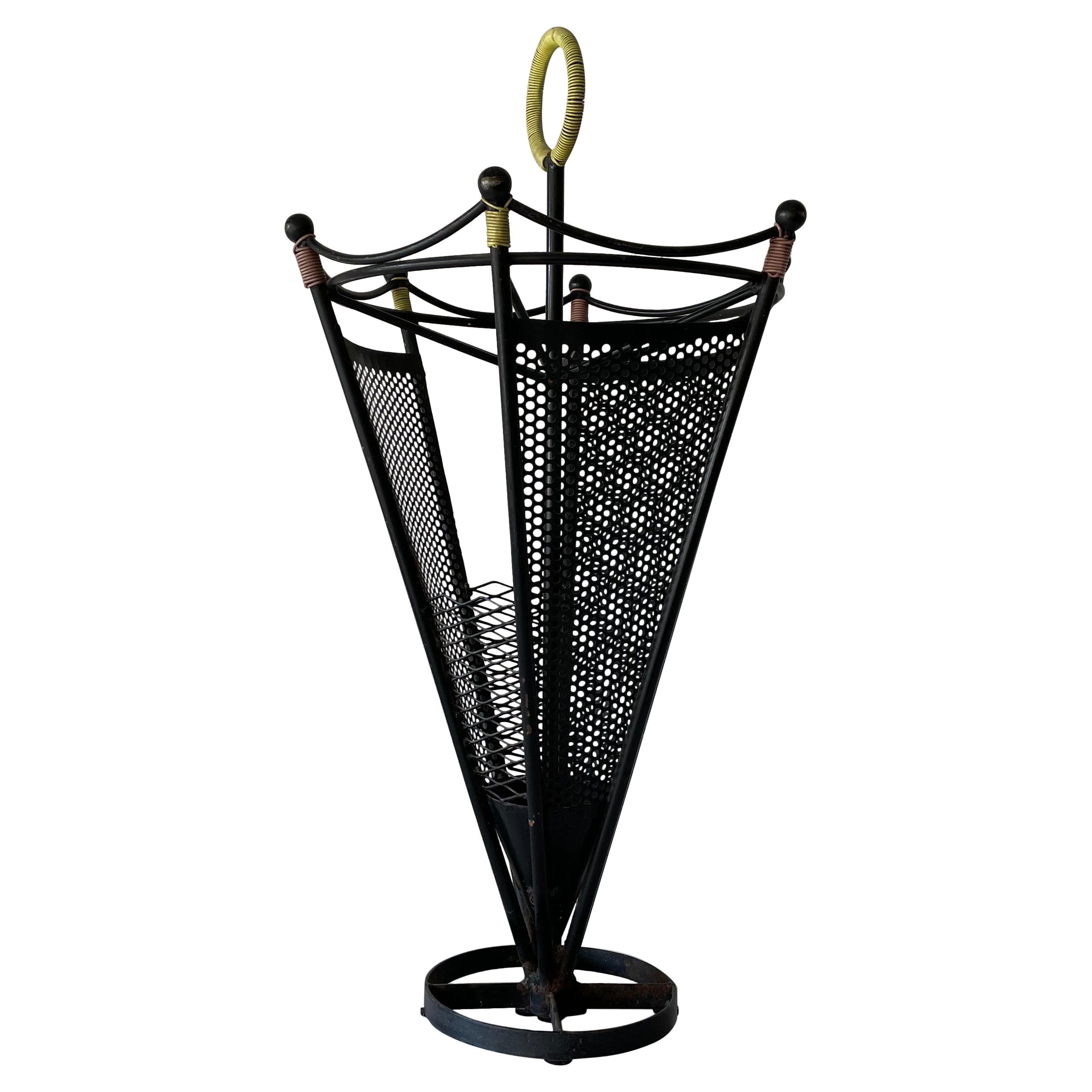 Paragüero de metal negro con asa circular amarilla, años 50, Alemania en venta