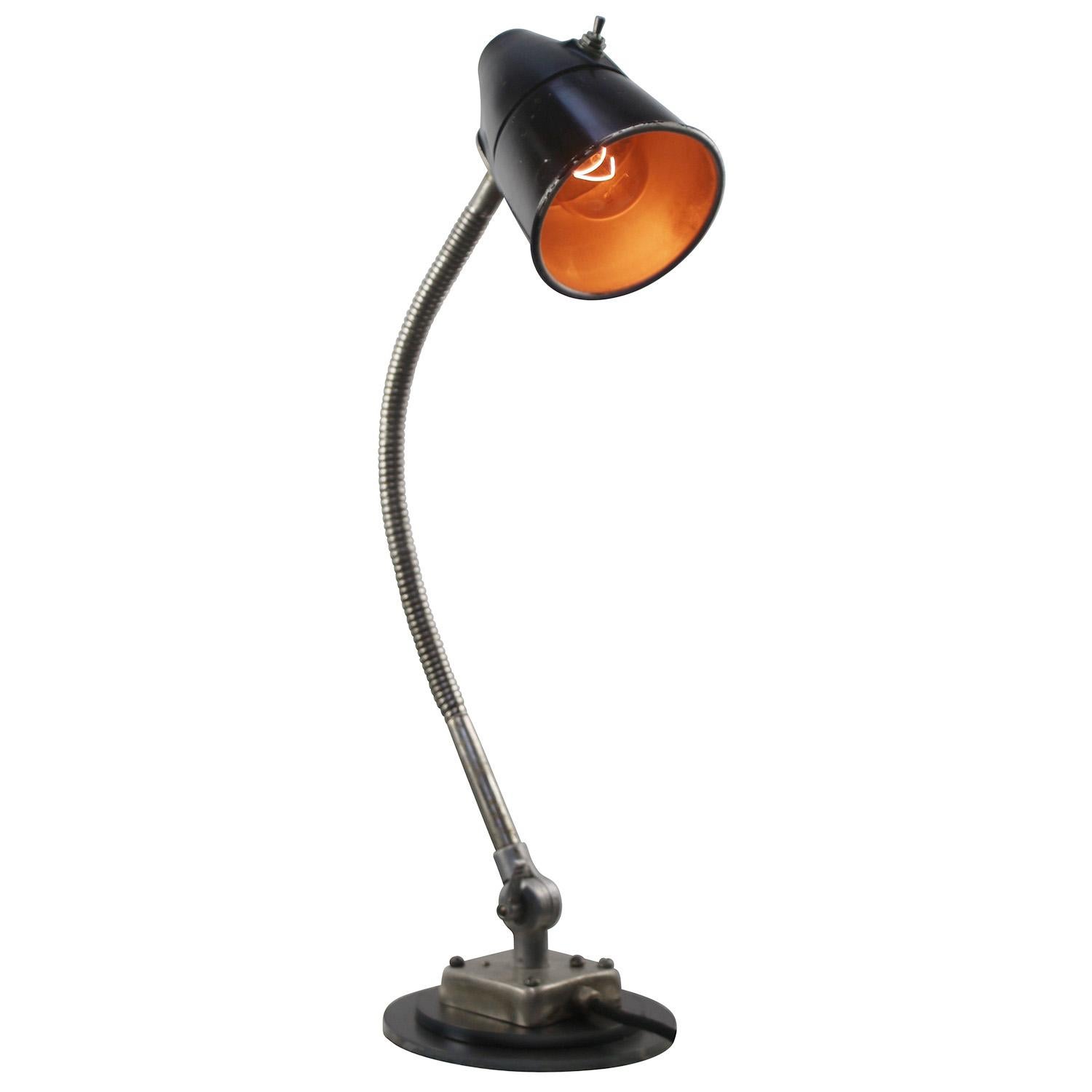 Metal work light / table desk lamp with gooseneck arm
Black metal shade with Bakelite top
Switch in shade

Available with UK / US plug

weight 4.00 kg / 8.8 lb

Priced per individual item. All lamps have been made suitable by international standards