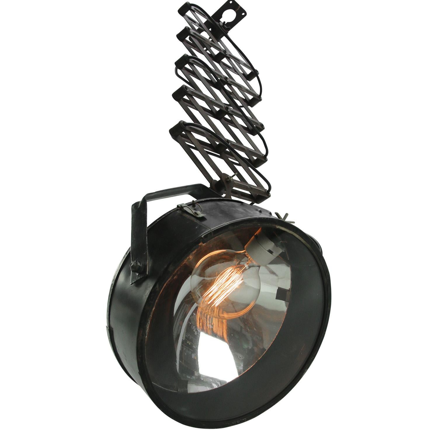 Double industrial metal scissor spring with voluminous spotlight
easy adjustable in height 
black metal, glass lens and mirror inside

Spotlight size: diam. 30 cm
90° angle adjustable shade

as shown on picture 109 cm
min. length 65 cm
max.