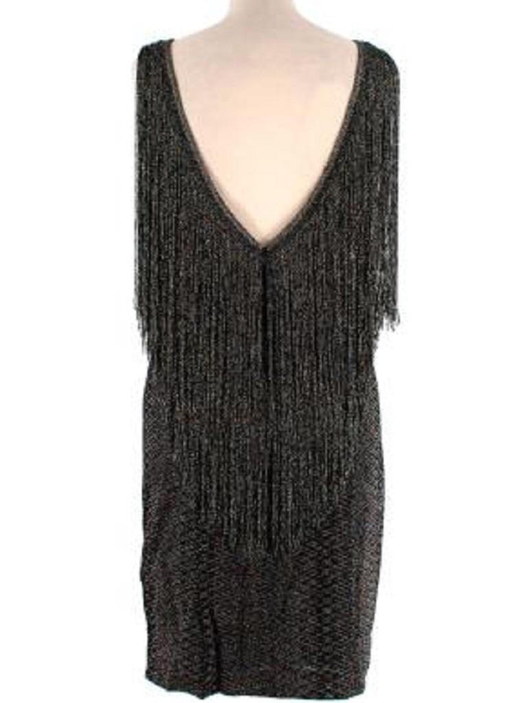 Missoni black metallic fringed dress
 

 - Fine stretch-knit in black with a pastel lurex thread running through
 - High neck and deep v-back with fringing 
 - Form-fitting with integral bust cups
 - Above-knee length
 - Part-lined 
 

 Materials: 
